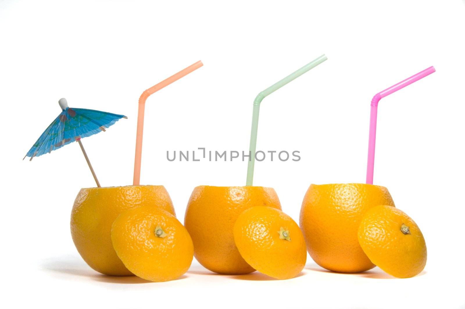 Three oranges with drinking pipes on white background