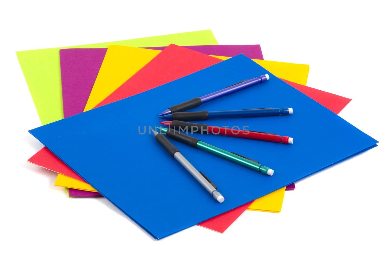 Colorful folders and pencils with erasers