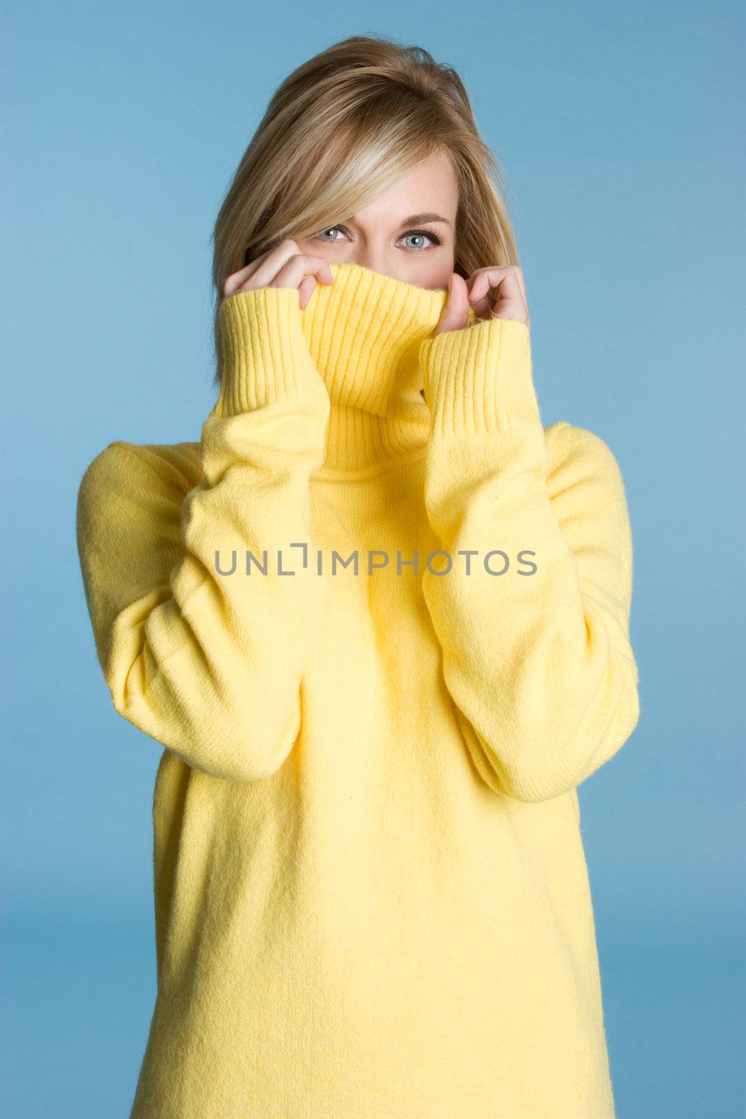 Pretty girl wearing yellow sweater