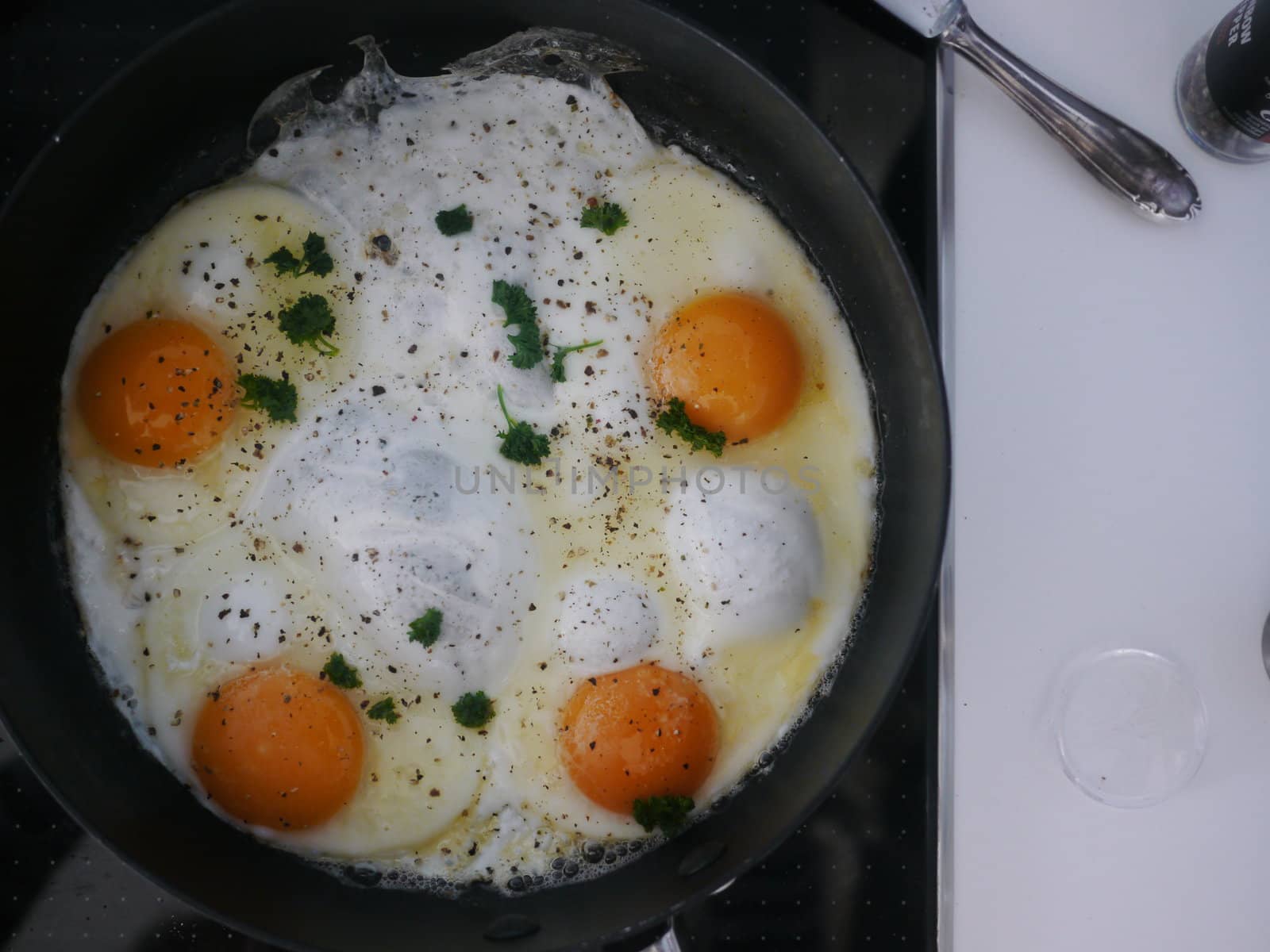 Fried egg on black pen. close up