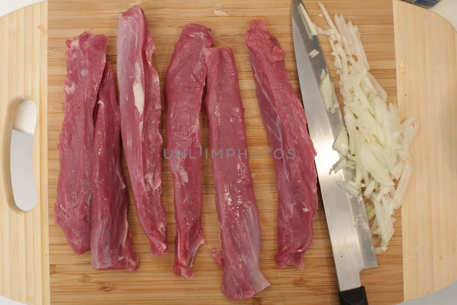 raw lamb on a wooden surface table