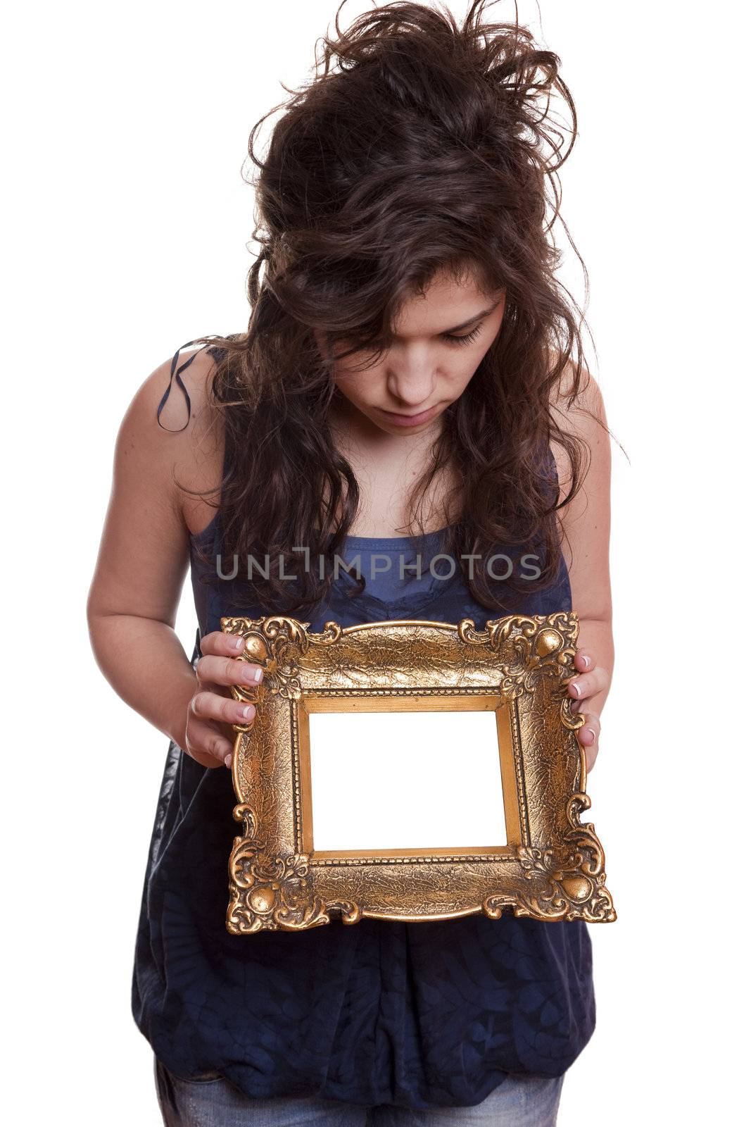 Woman holding an picture frame by adamr