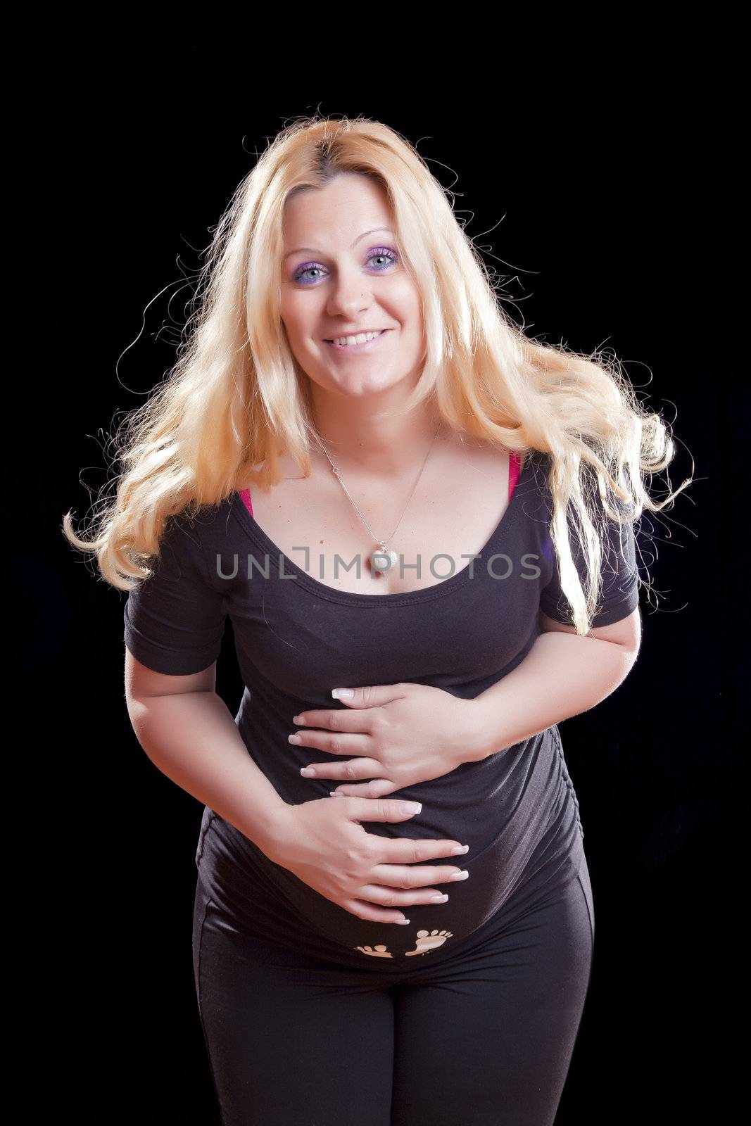 Future mother - Pregnant woman holding tummy