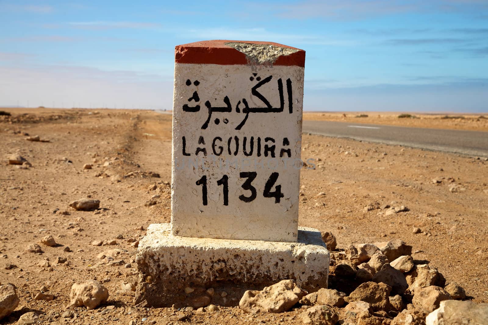 Road Sign to Lagouira in Morocco with blue sky