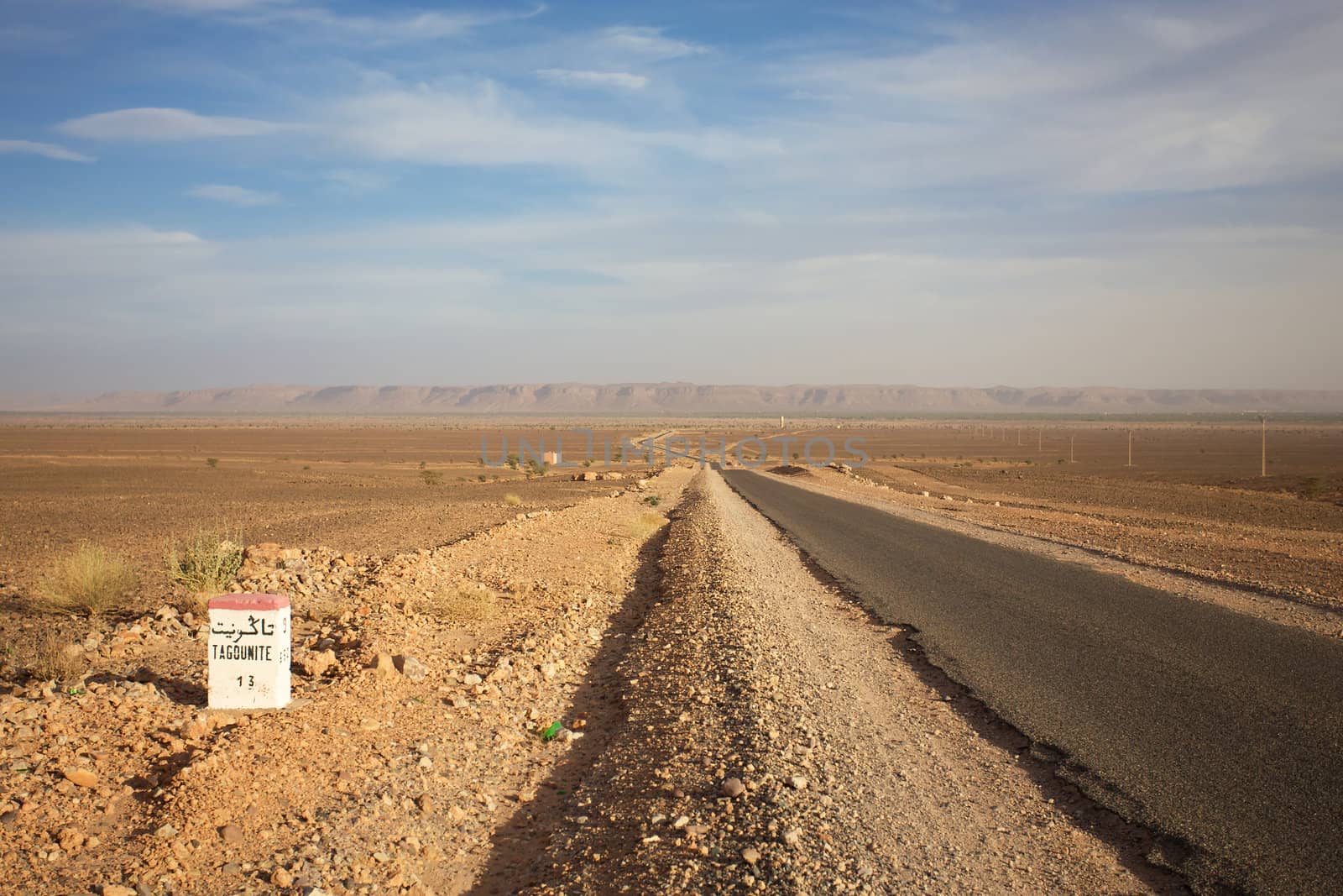 Road Sign to Tagounite in Morocco with blue sky