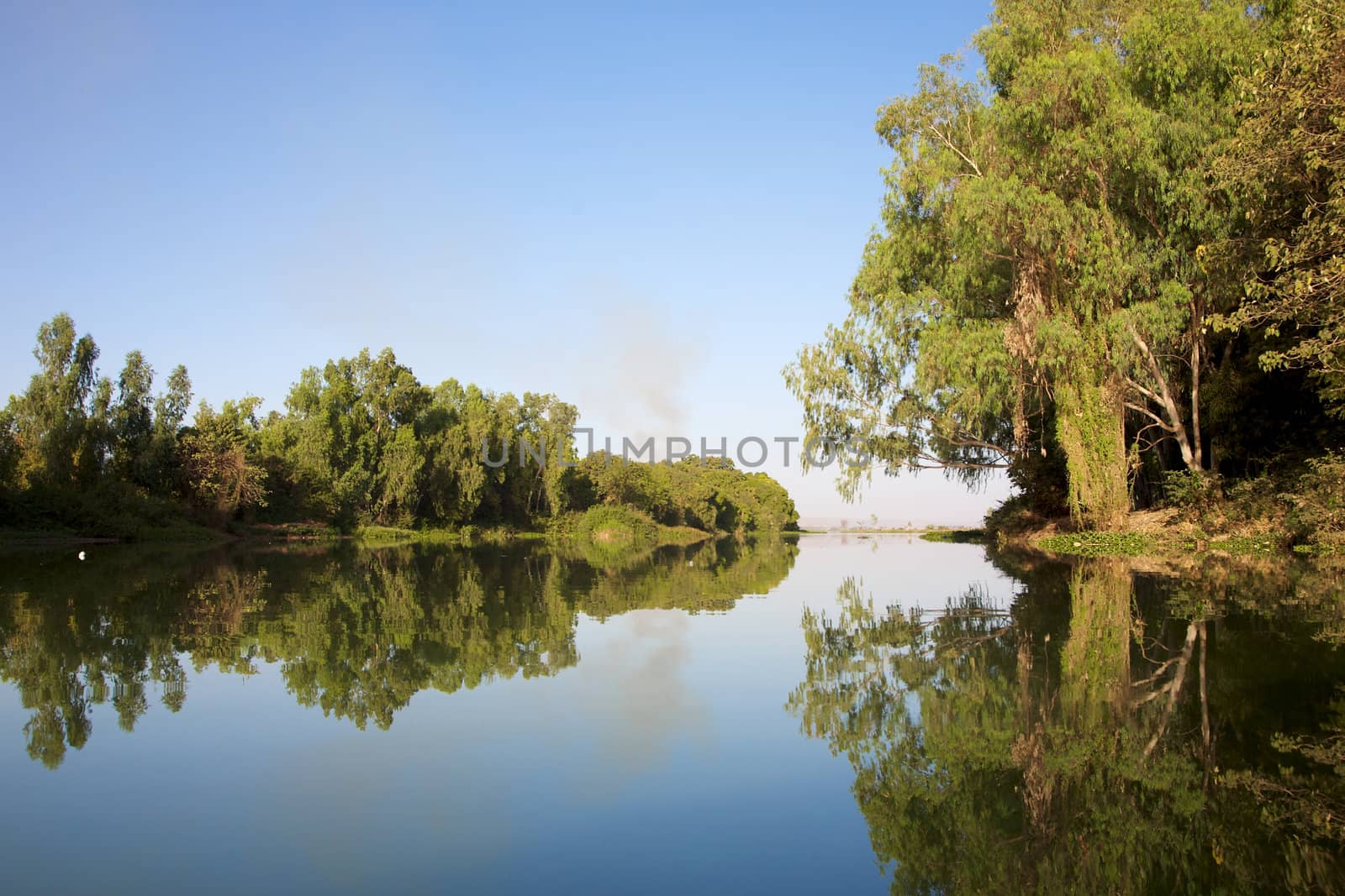 Reflections in the river by watchtheworld