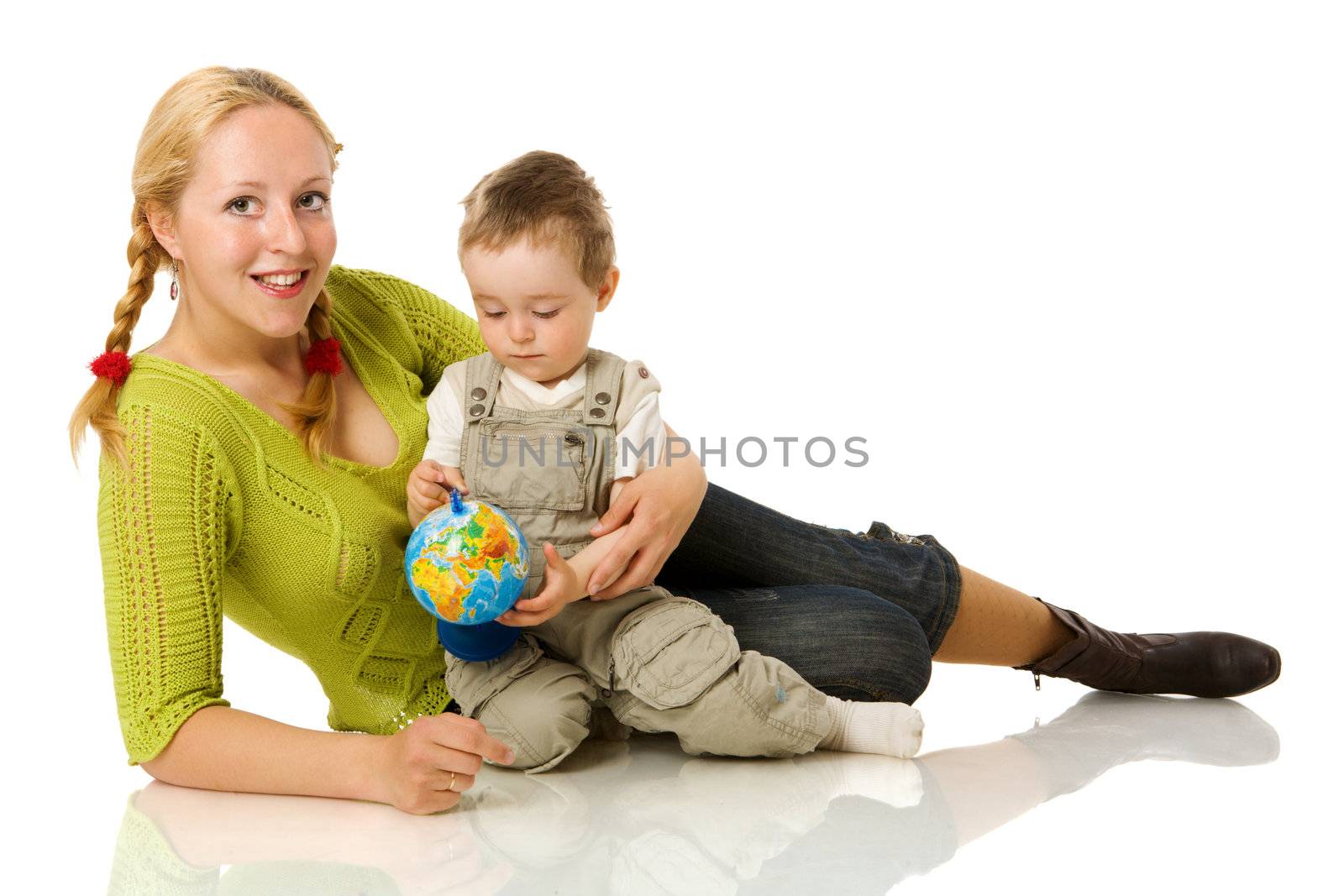 Happy mother holding globe with son isolated on white
