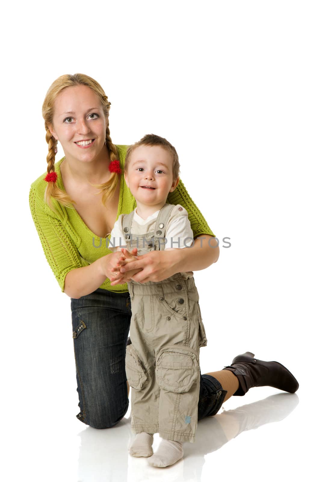 Happy mother holding two years son isolated on white