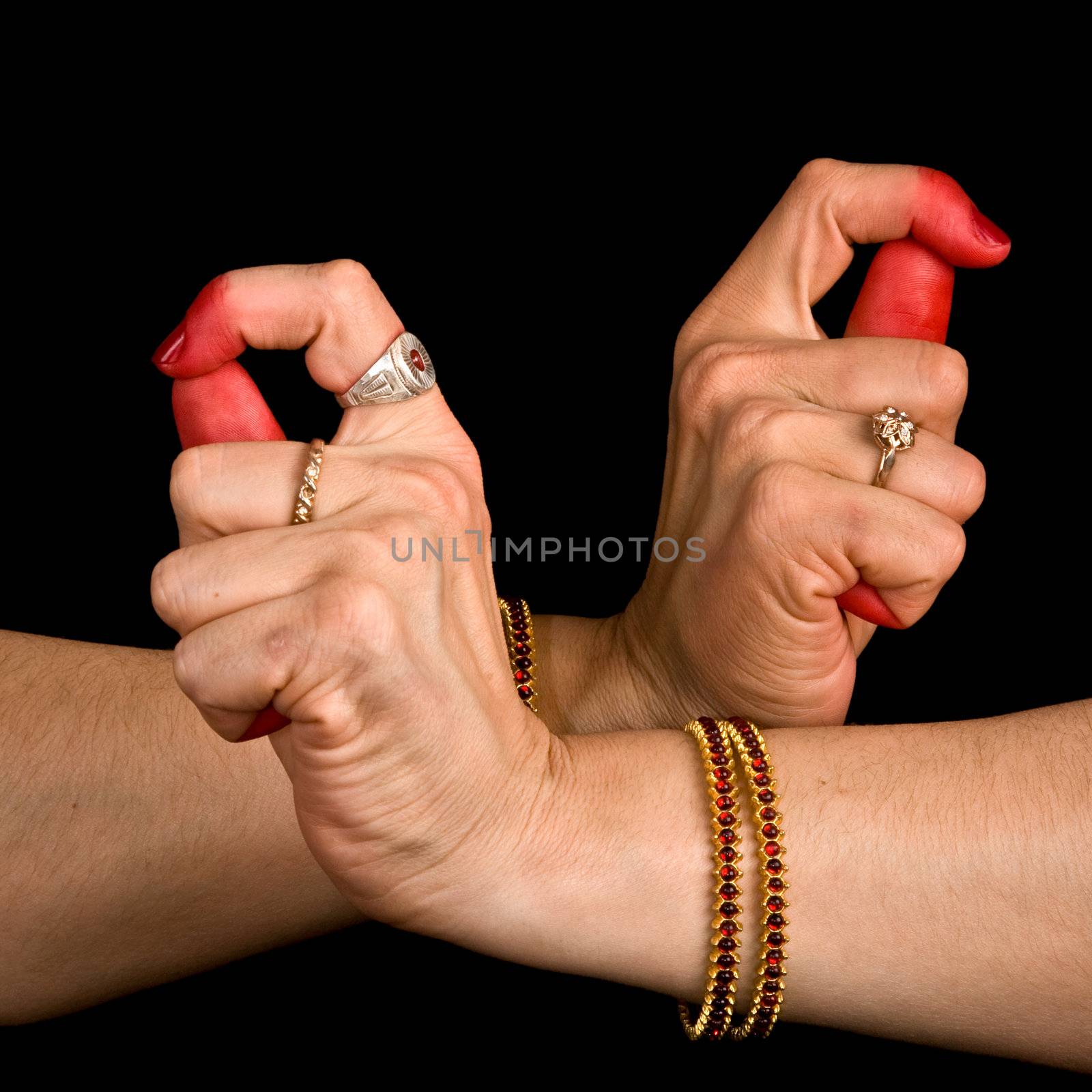 Women hands showing Bherunda hasta of indian classic dance Bharata Natyam