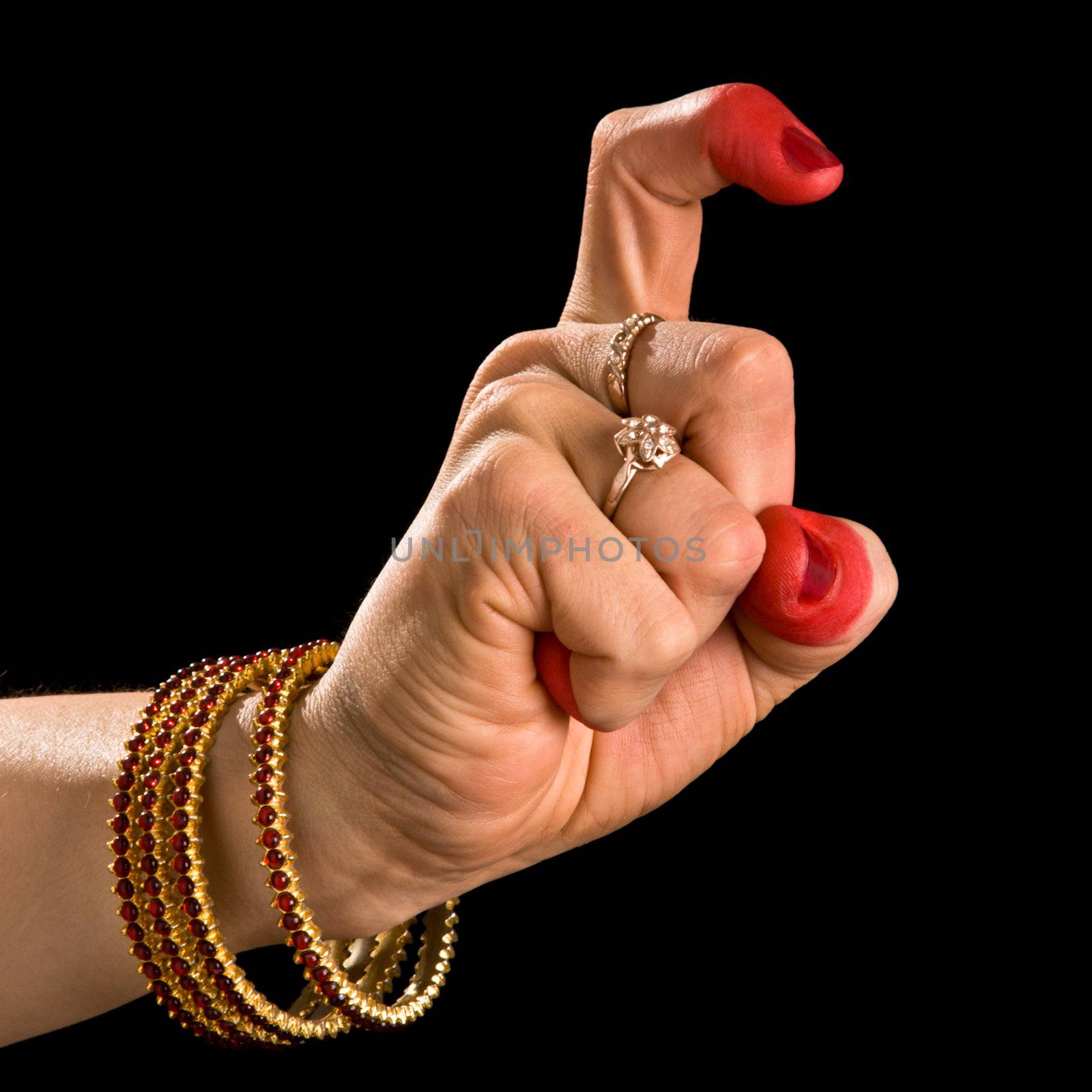 Woman hand showing Tamrachuda  hasta (hand gesture, also called mudra) (meaning "rooster") of indian classic dance Bharata Natyam. Also used in other indian classical dances Kuchipudi and Odissi.