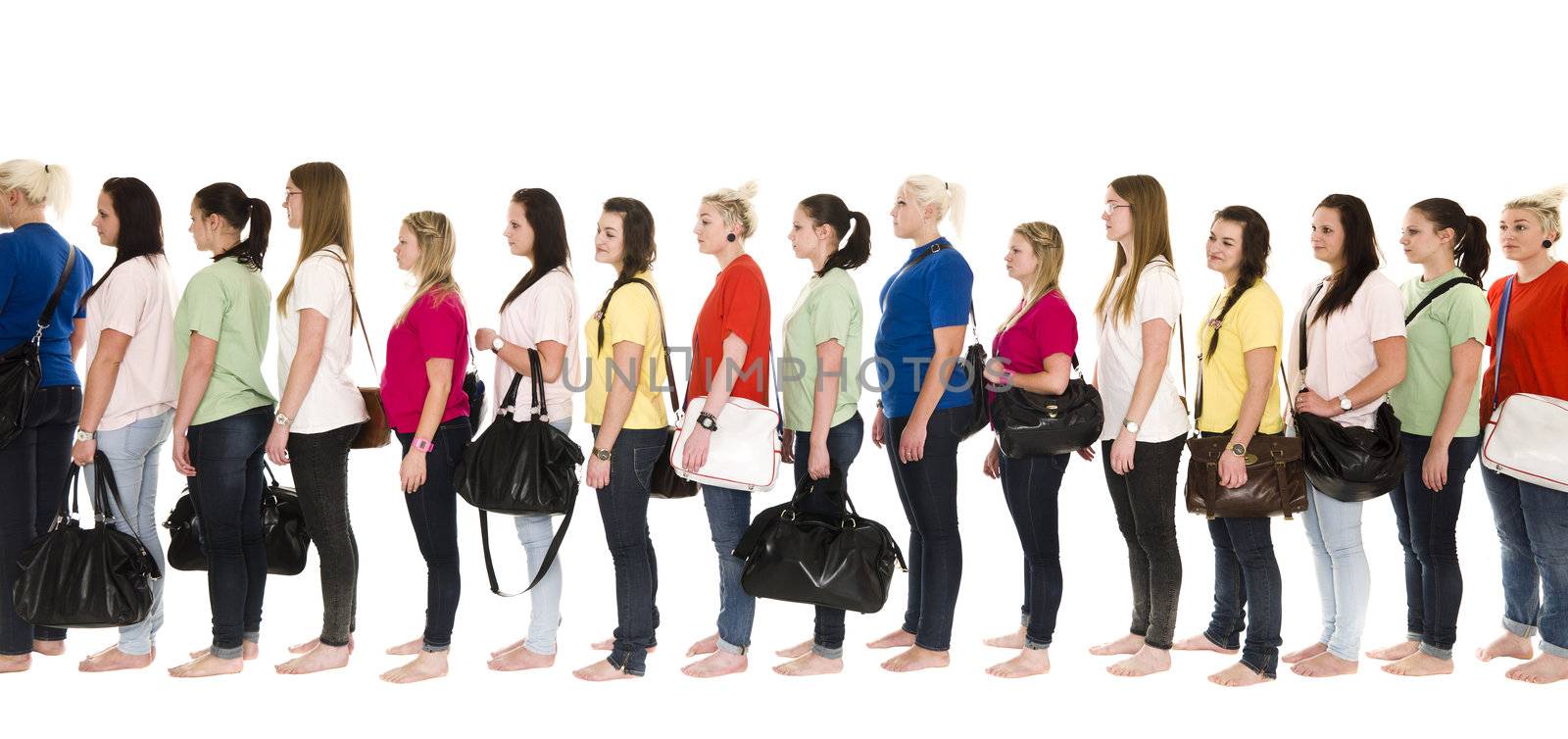 Girls in colorfull t-shirts in a line on white background