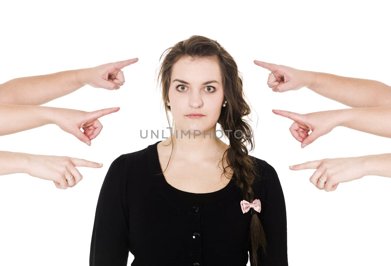 Group of Hands pointing at a woman on white background