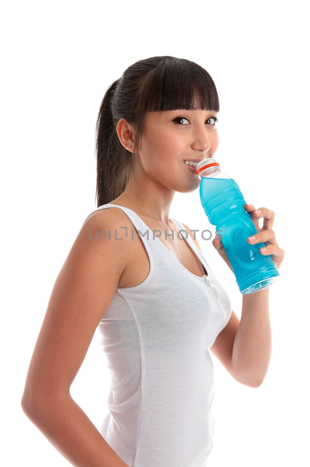 Attractive girl drinking sports drink after exercise by lovleah