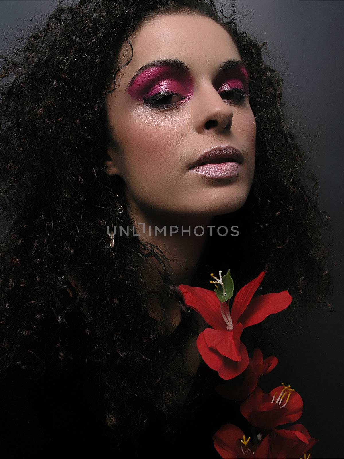 Lady With MakeUp and Red Flower