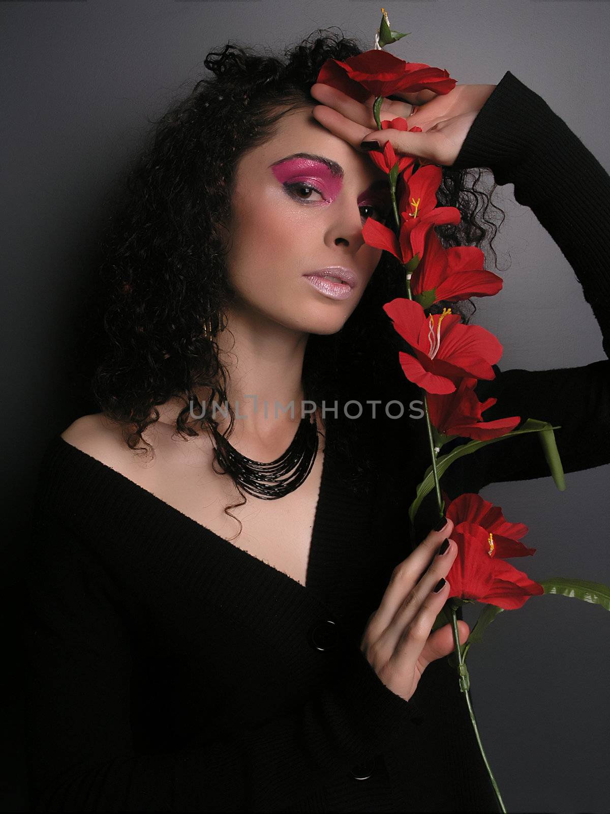 Lady With MakeUp and Red Flower