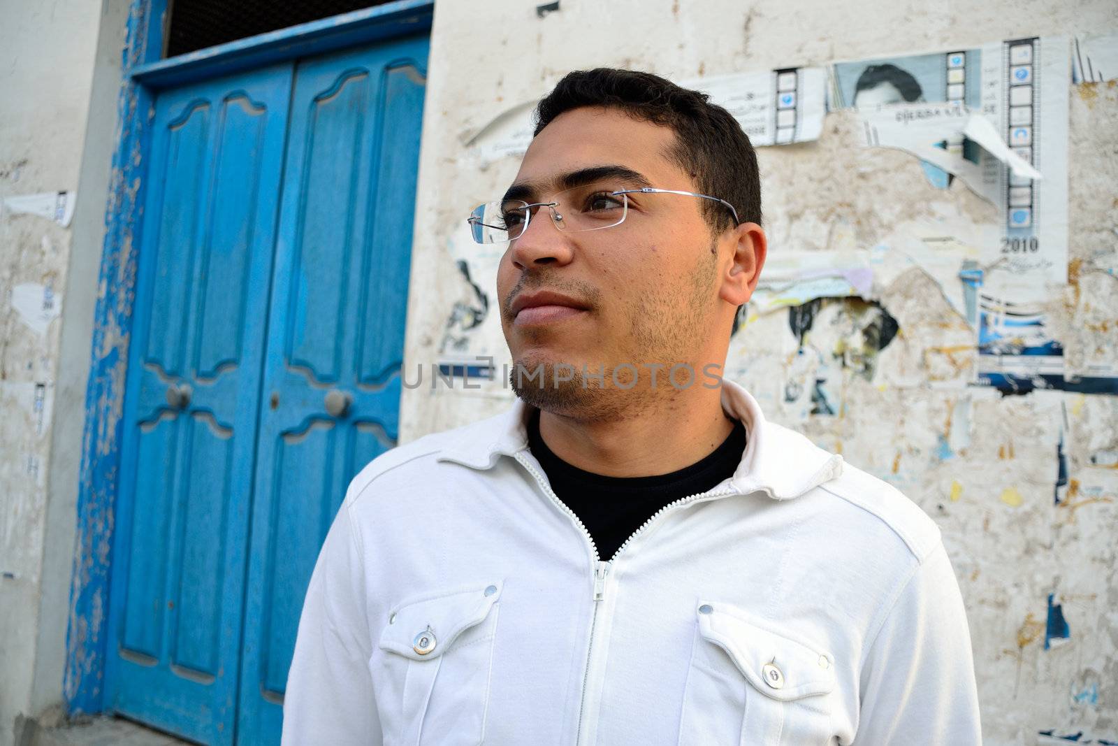 Pensive arab man on the streets of tunisia