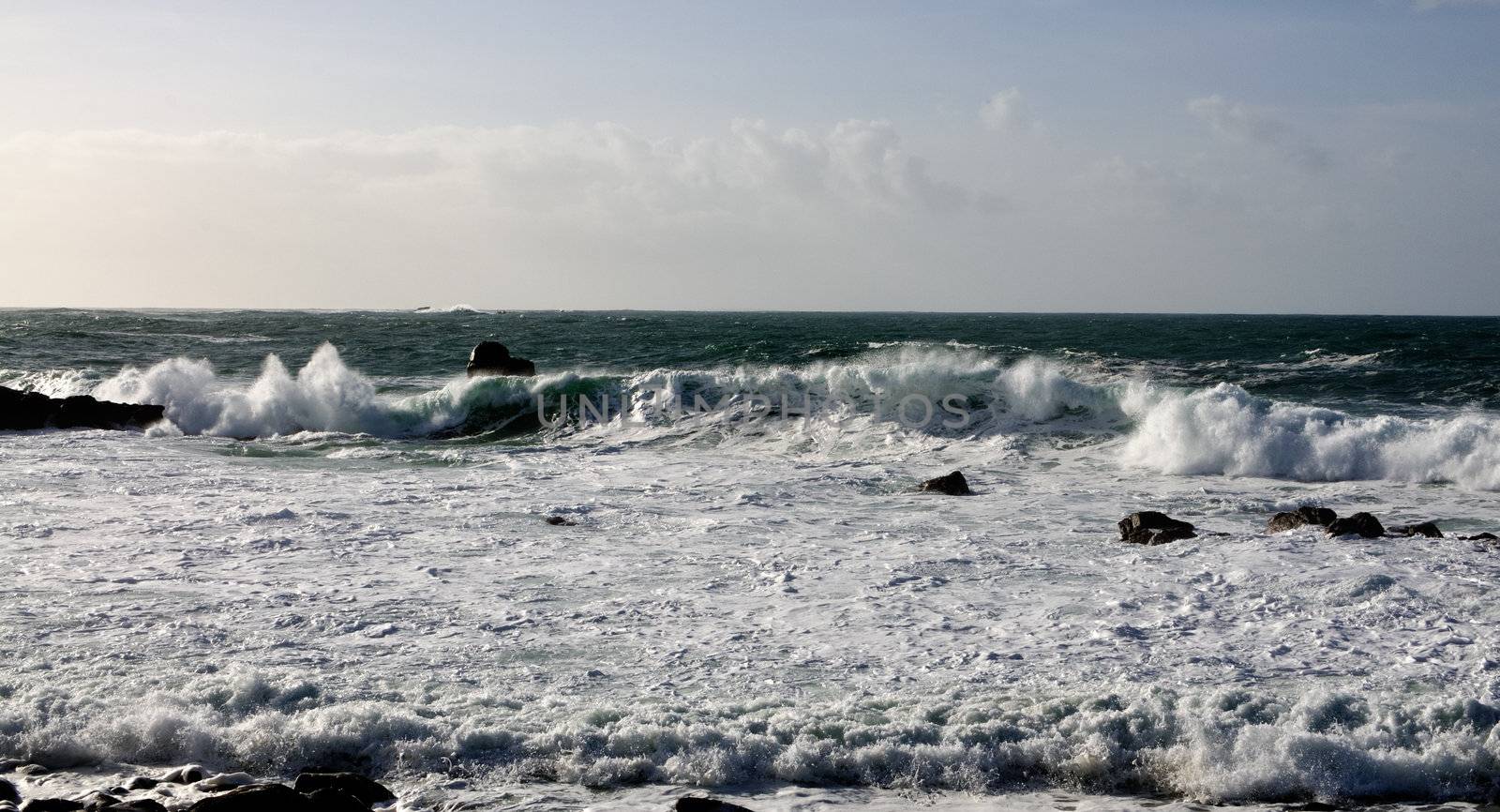 Waves at coast of brittany at stormy day.