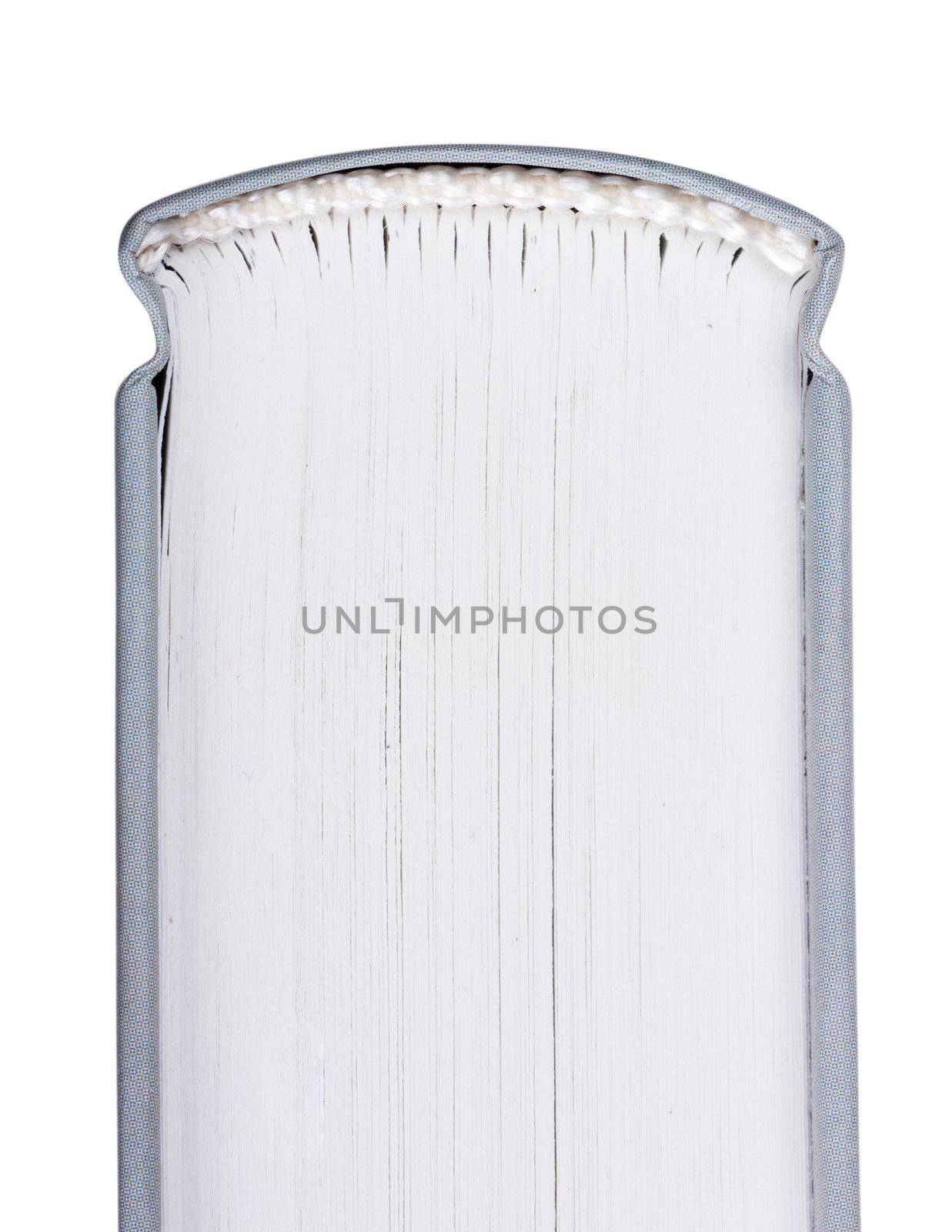 Macro view of binder of thick book isolated over white background