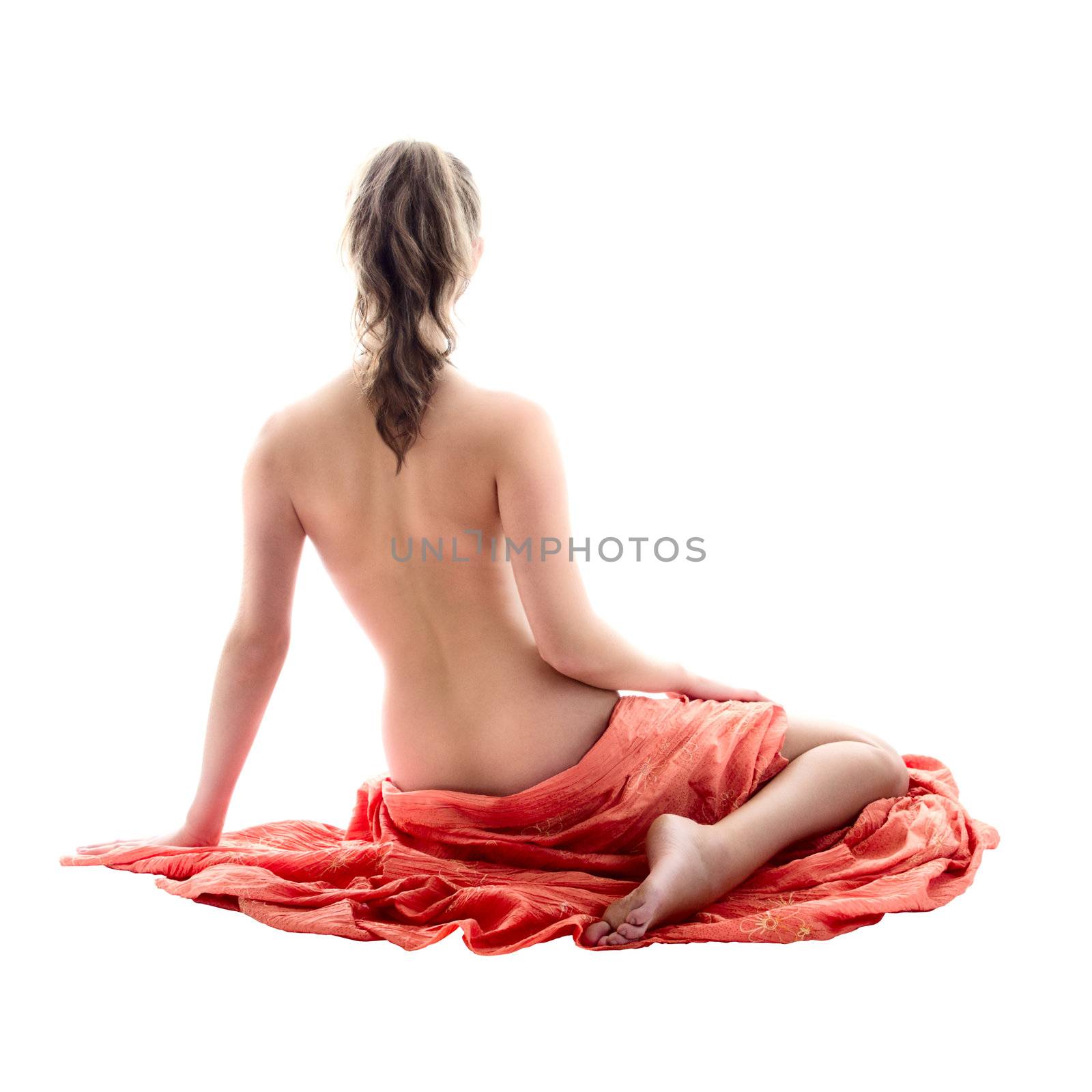 Back of the naked young woman isolated over white background