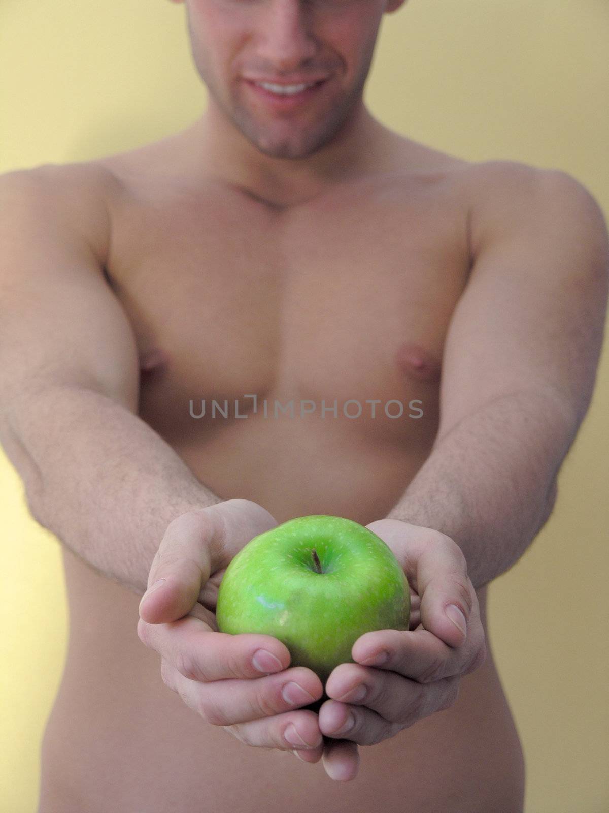 Man hold green apple