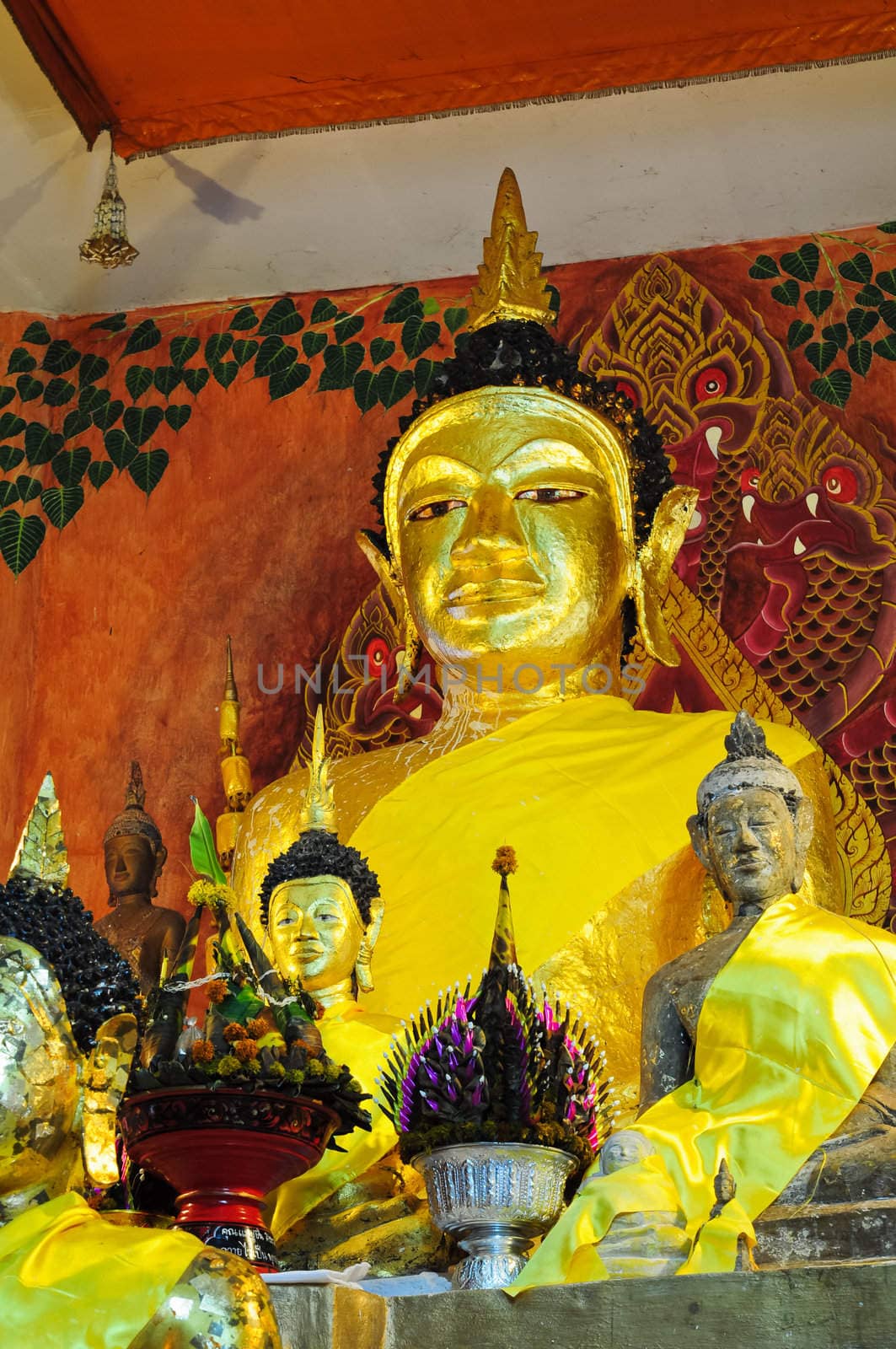 golden buddha statue by samurai