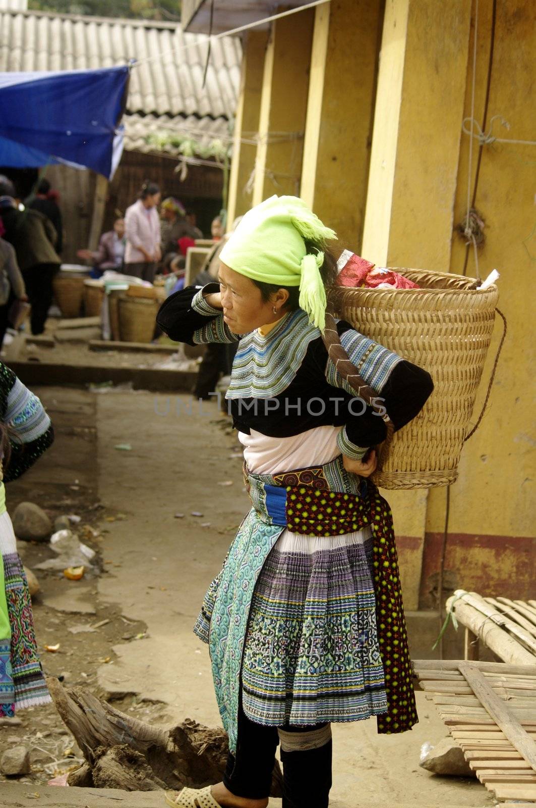 Woman of the Hmong blue Muong Hum market.