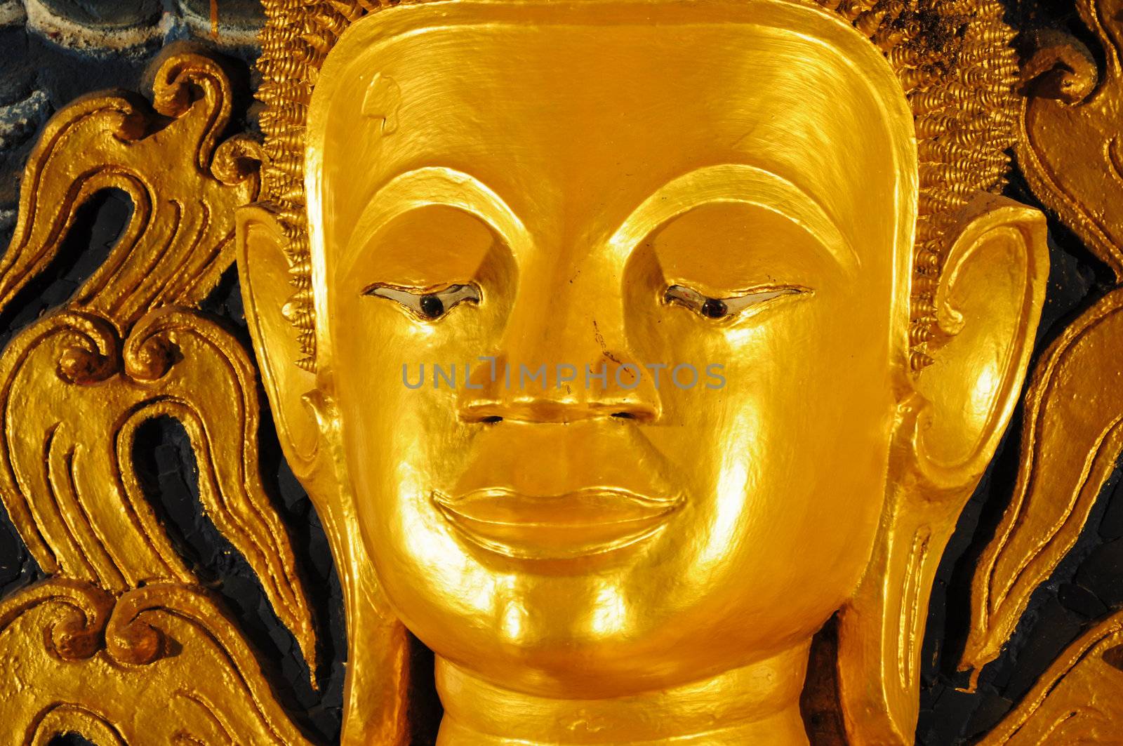 face of golden buddha ststue by samurai