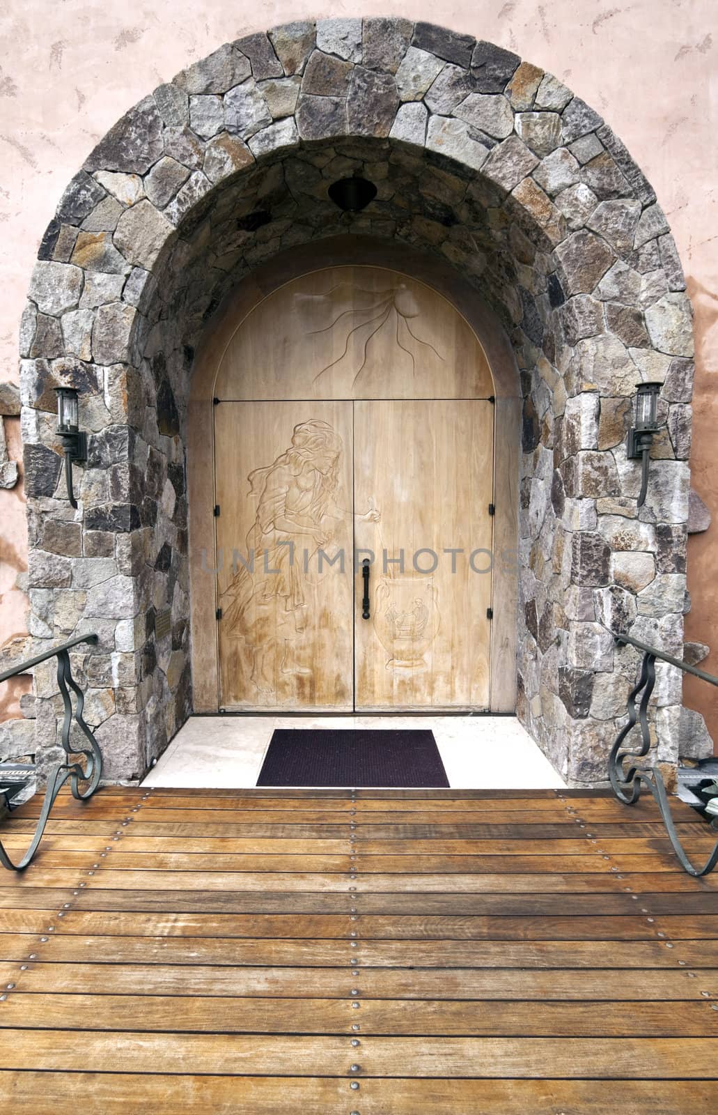 An old doorway with a pair of wood doors