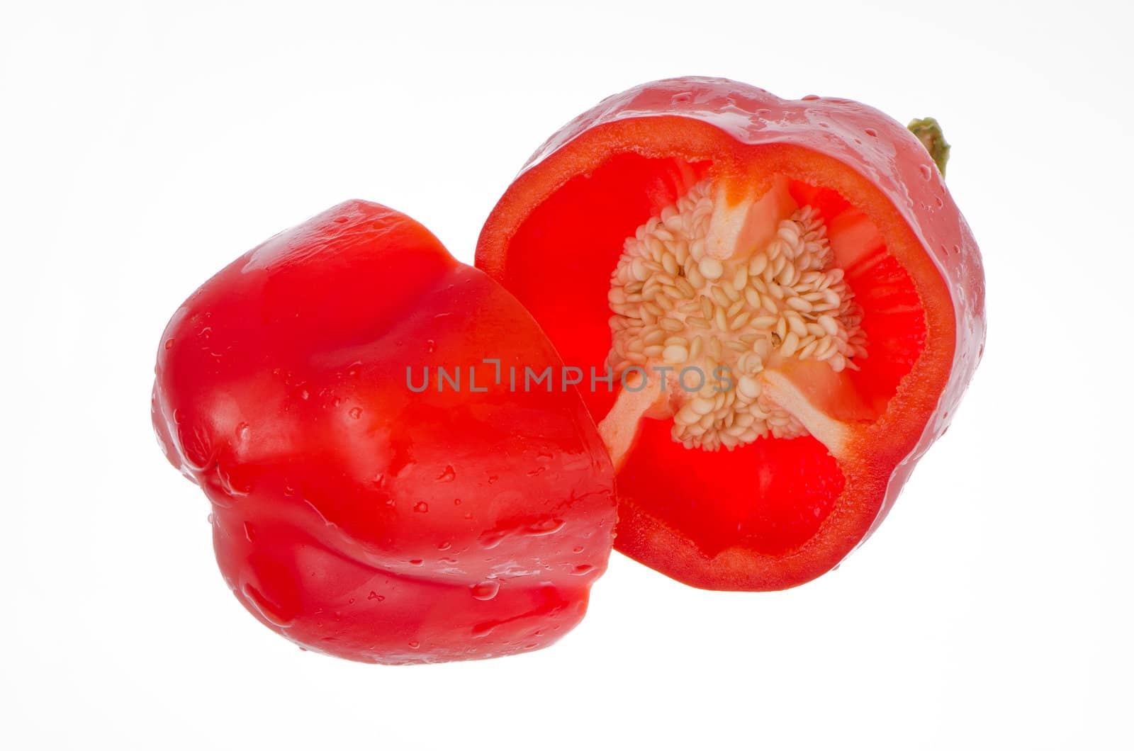 Red pepper close up isolated on white background.
