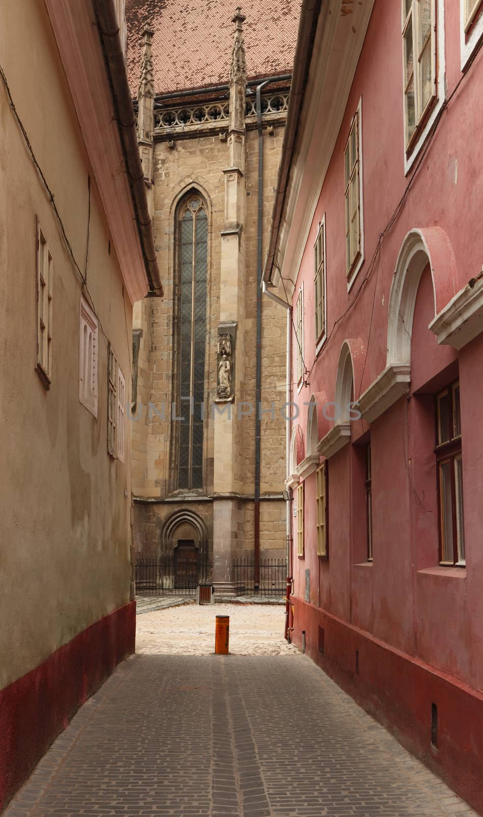 Backstreet near the Black Church in Brasov, Transylvania, Romania. Being over 500 years old, the Black Church is the the greatest Gothic church in Transylvania.