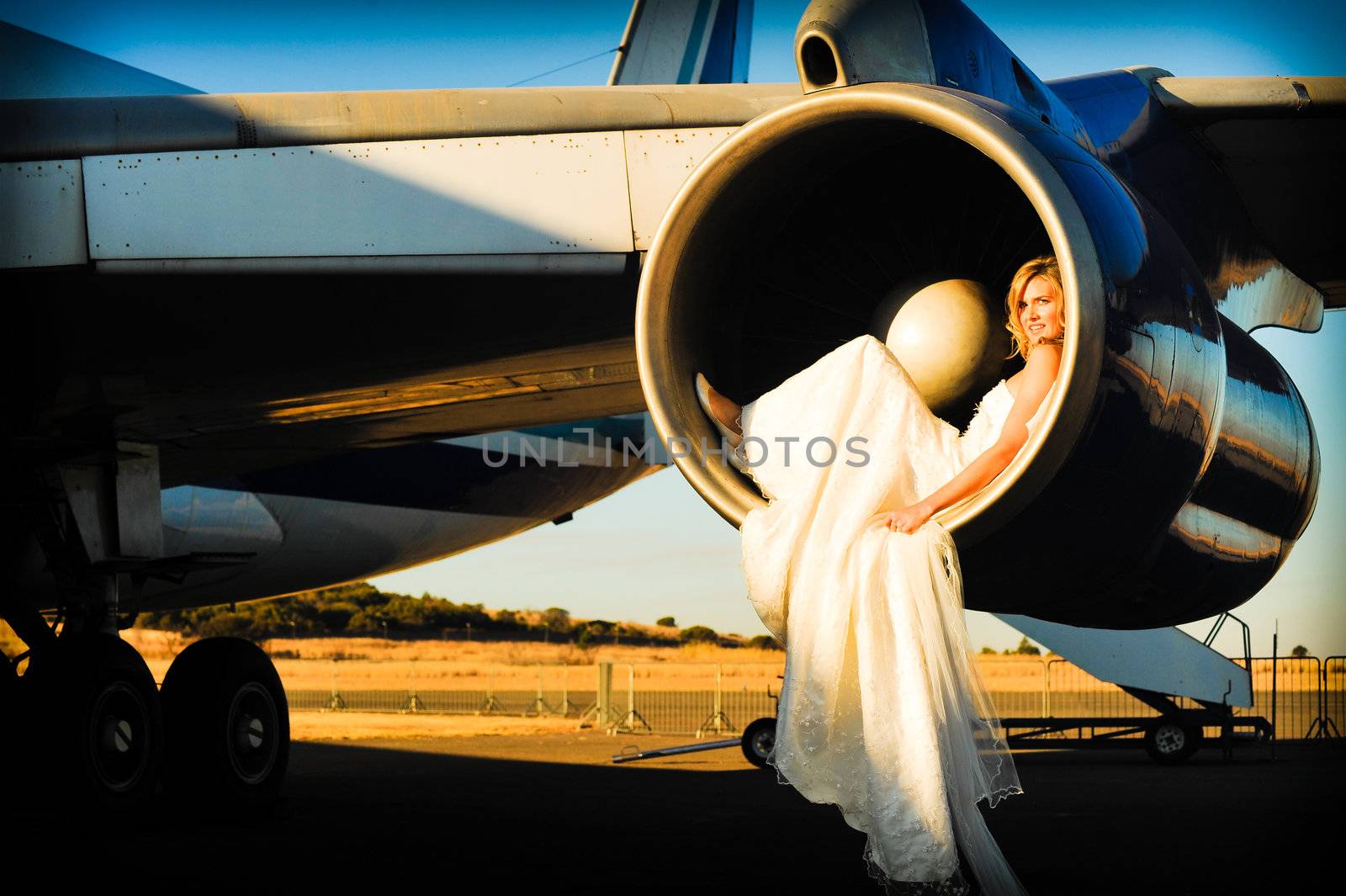 young wedding model laying inside engine intake by Ansunette