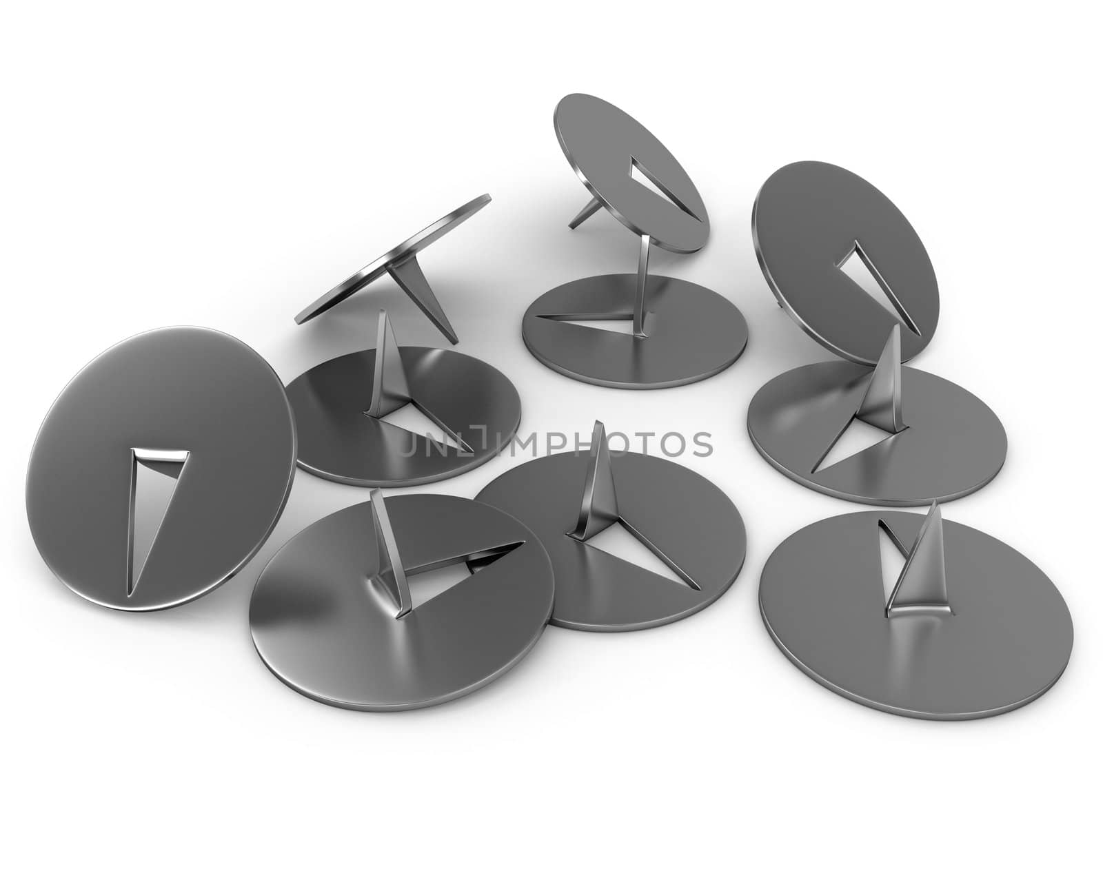 Few metal thumbtacks isolated on white background
