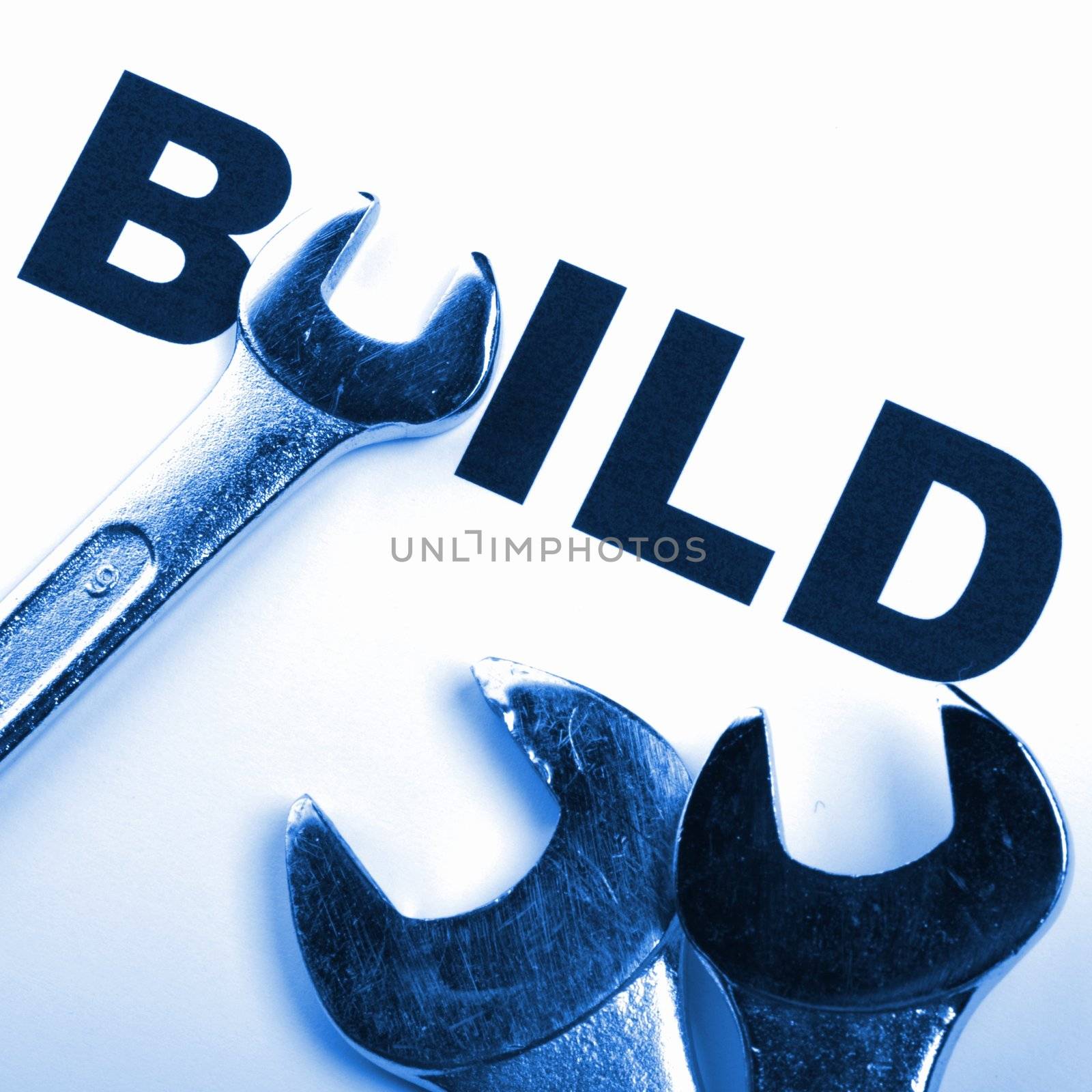 build and tools showing construction concept with word