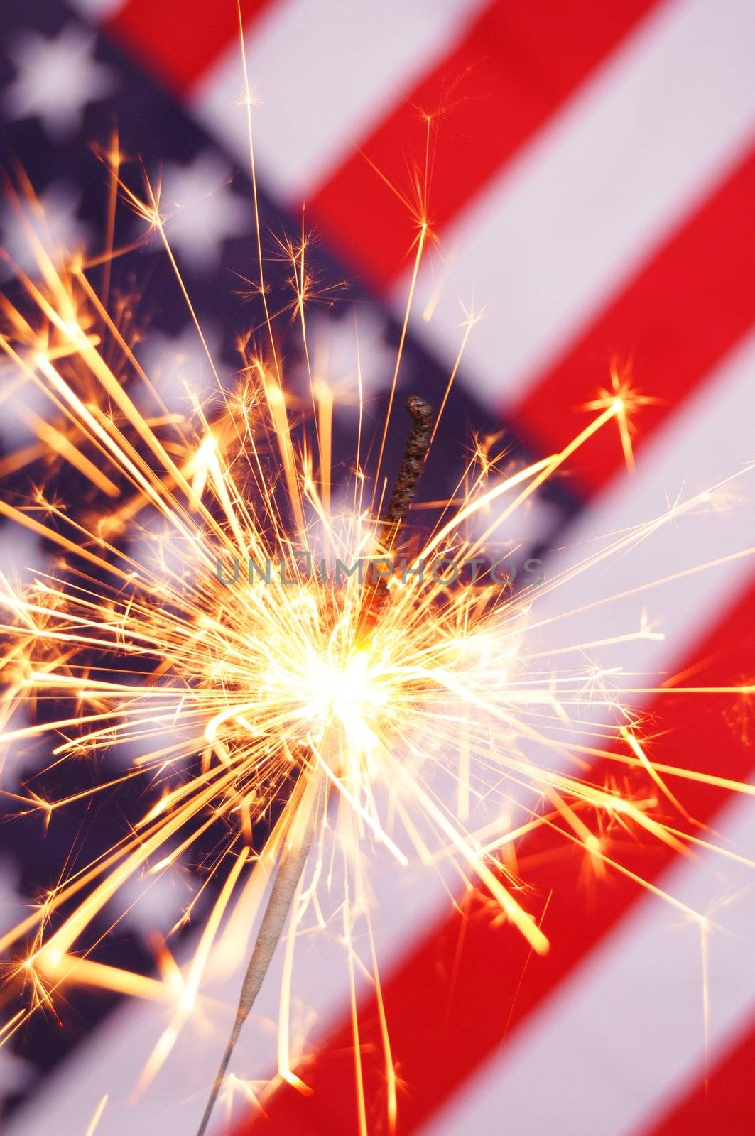 fourth of july concept with sparkler and usa flag