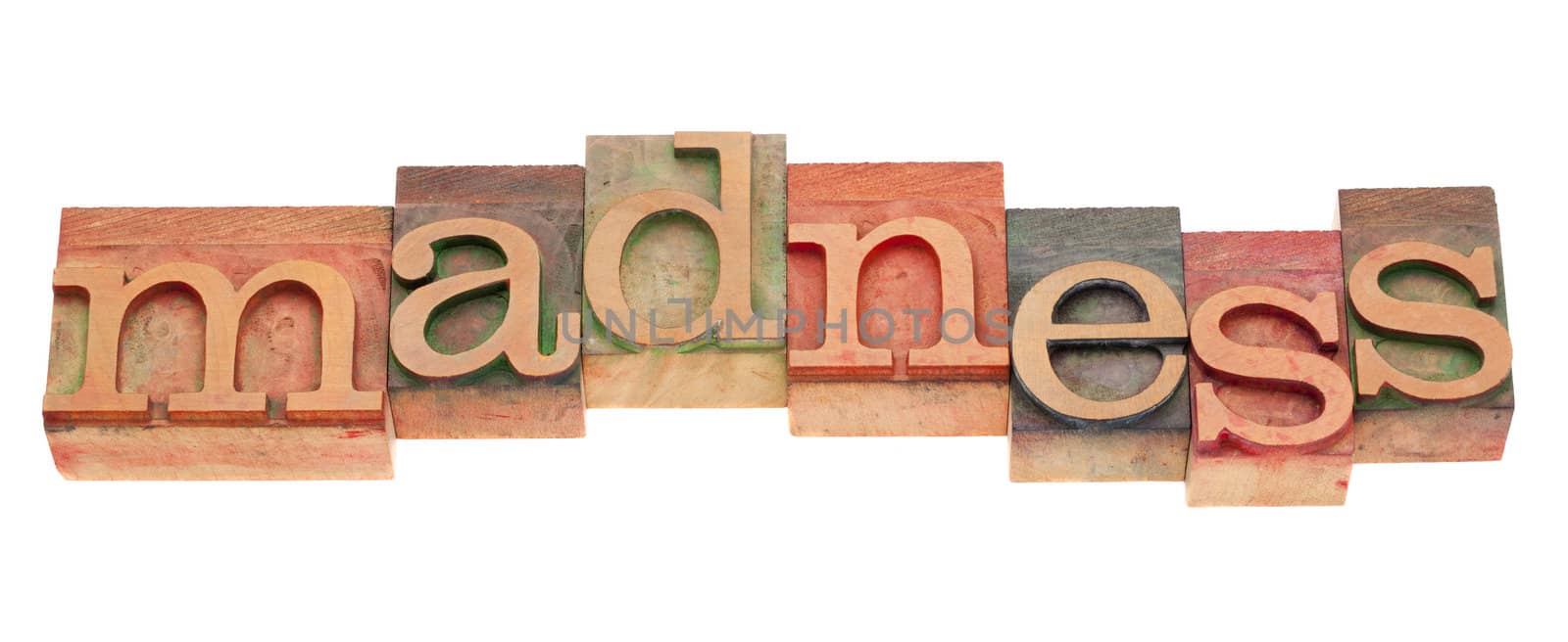 madness word in letterpress type by PixelsAway