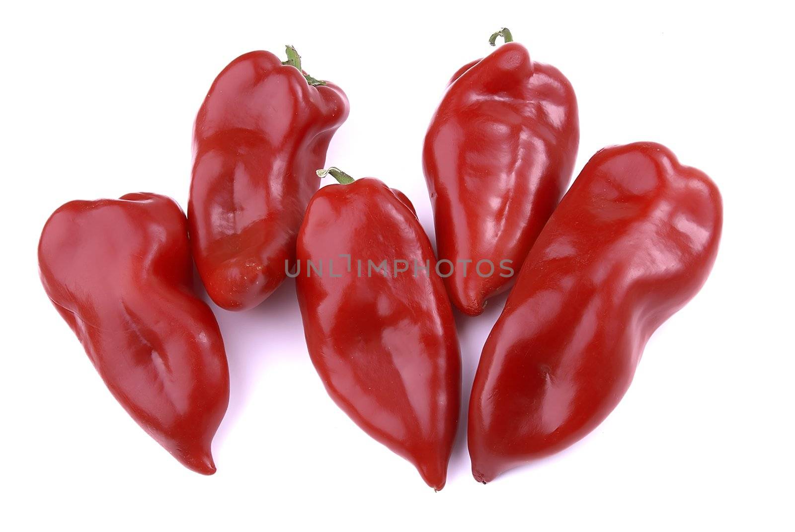 Peppers in group on white background