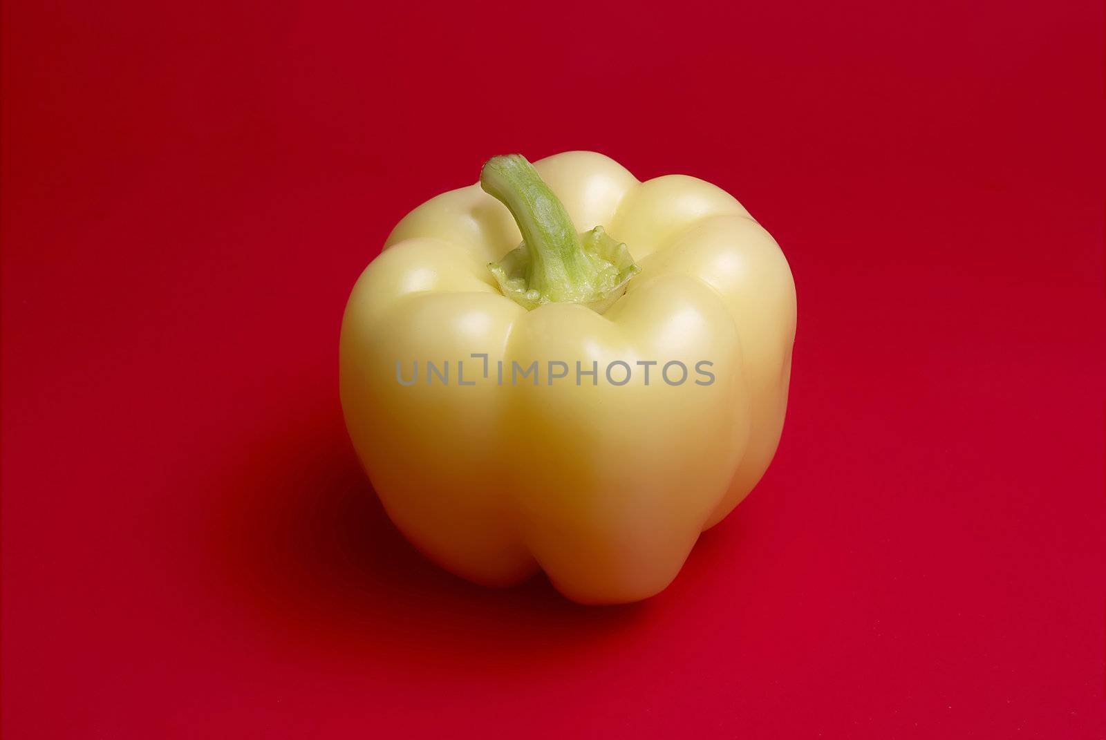 Yellow Peppers on red background, vegetable, 