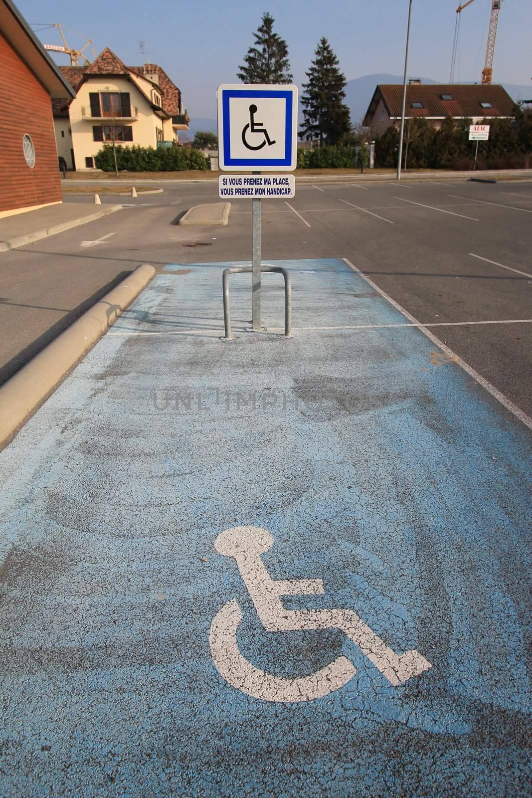 Disabled parking space by Elenaphotos21