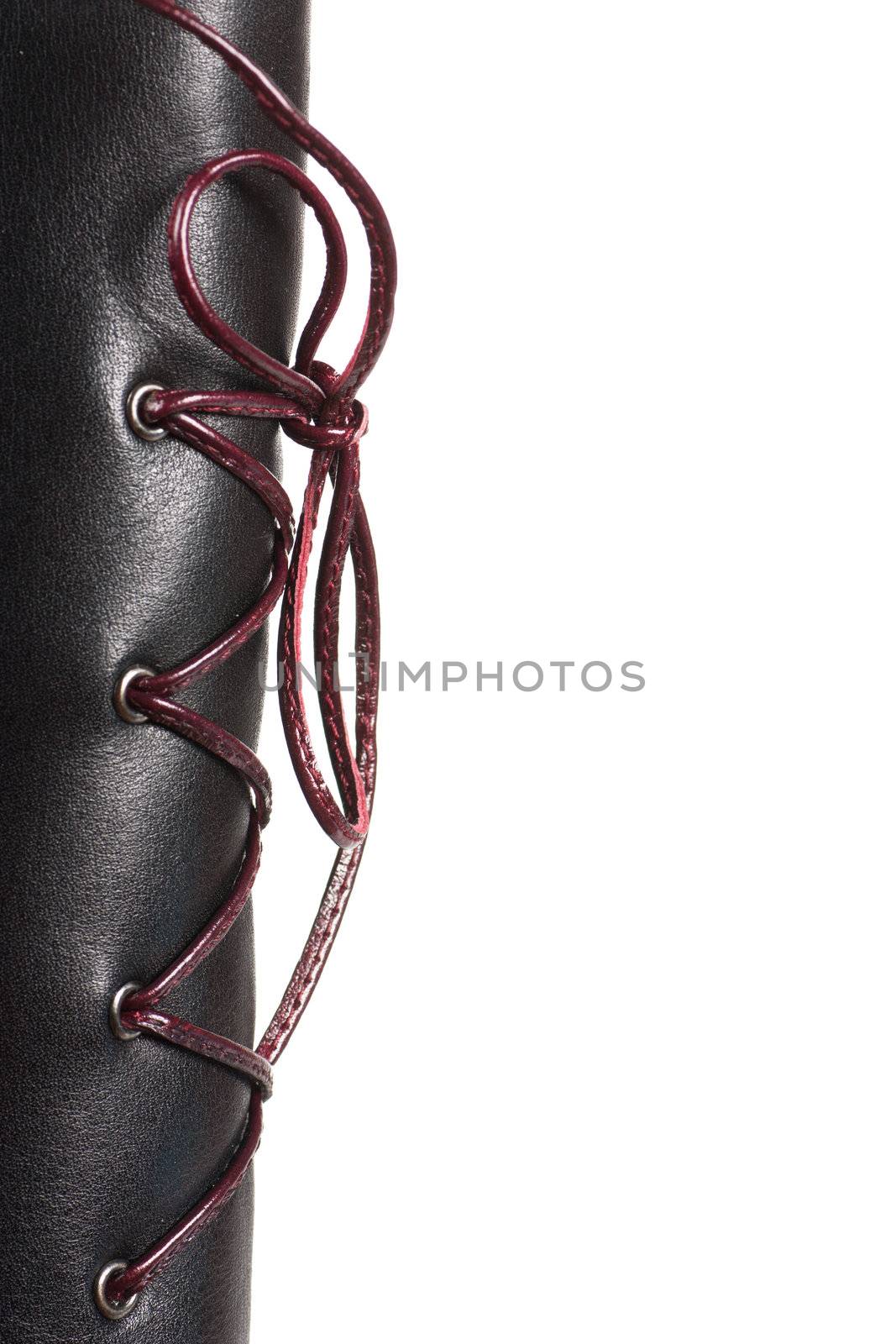 Lace on high leather boot isolated over white