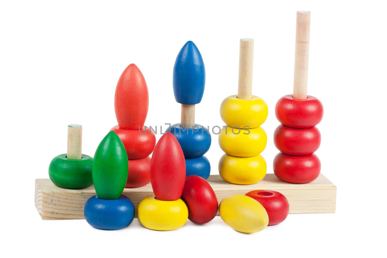 Colorful developmental toy with building blocks isolated over white