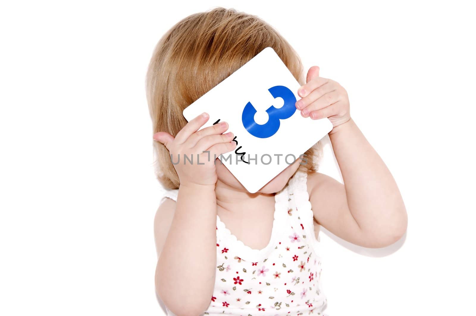 The child learns figure three on a white background