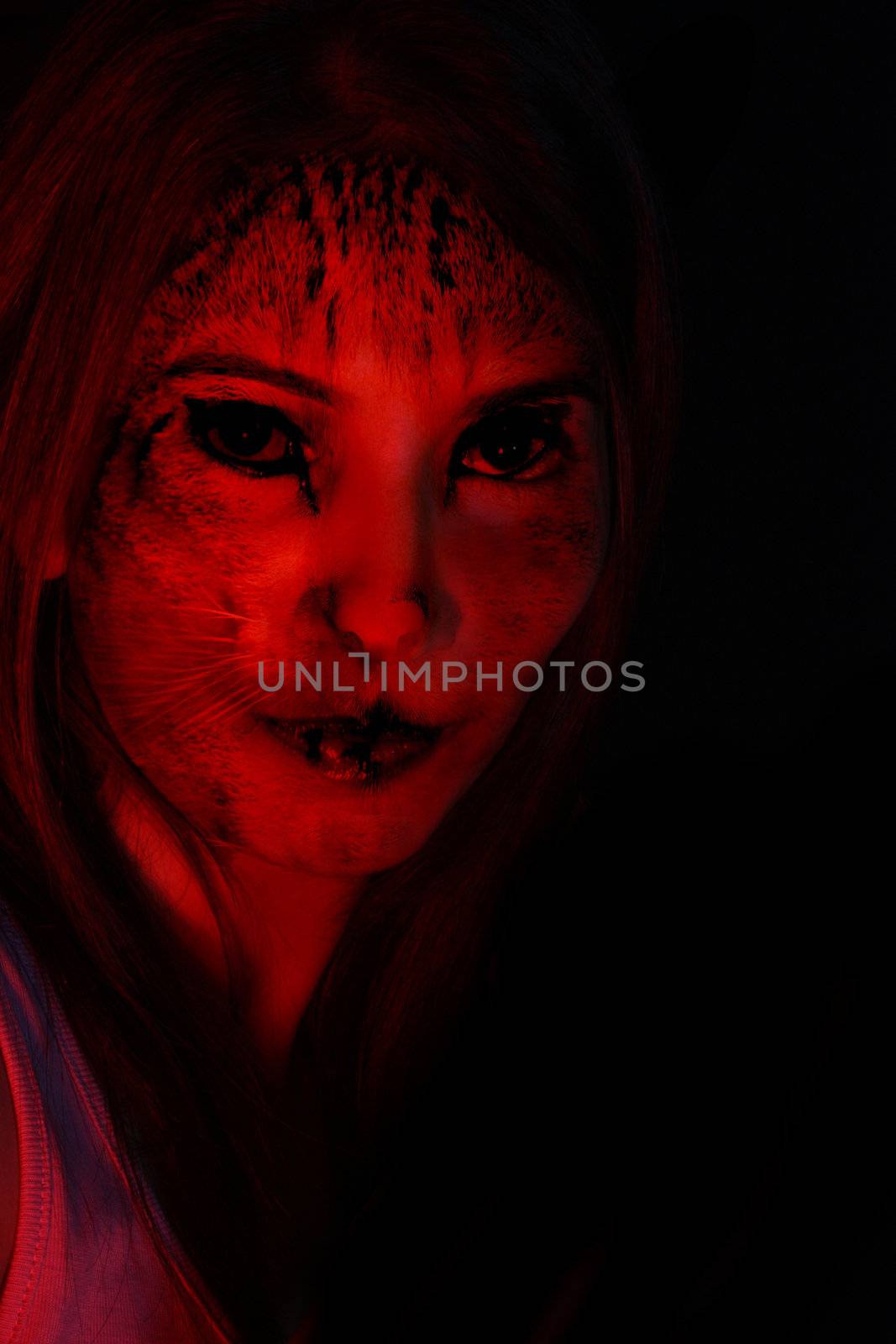 A portrait of a beautiful mutant cat woman, in the dark.