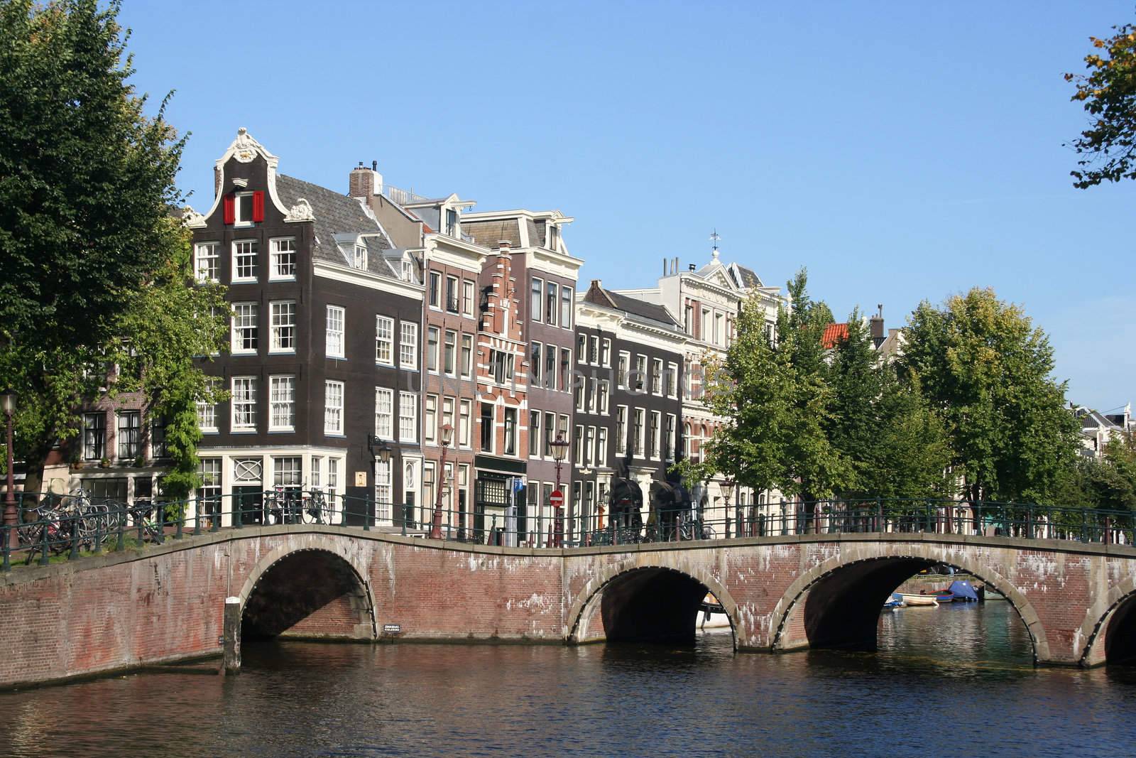 Historical bridge over canal in Amsterdam, Holland