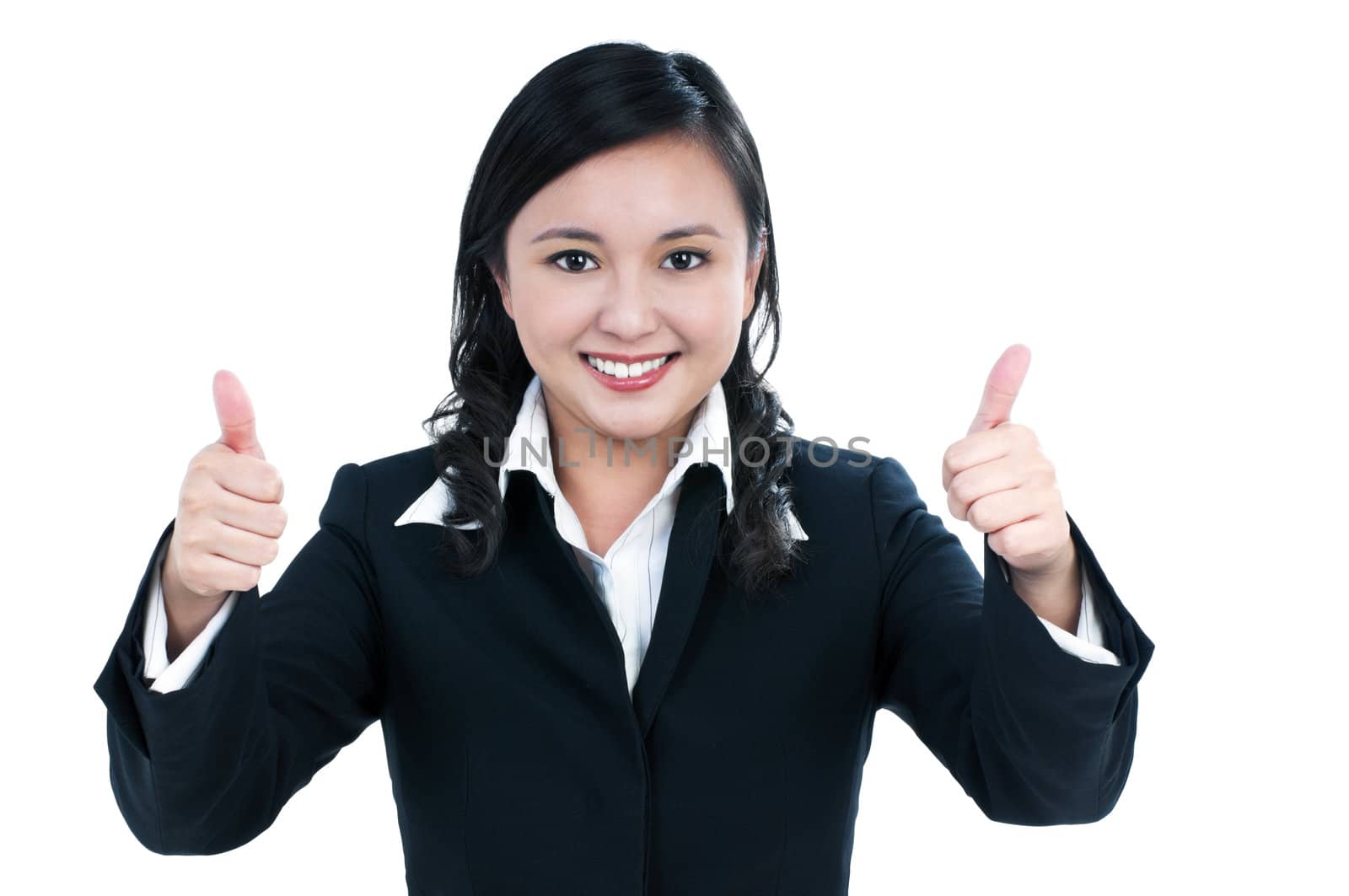 Portrait of an attractive businesswoman giving thumbs up sign, over white background.