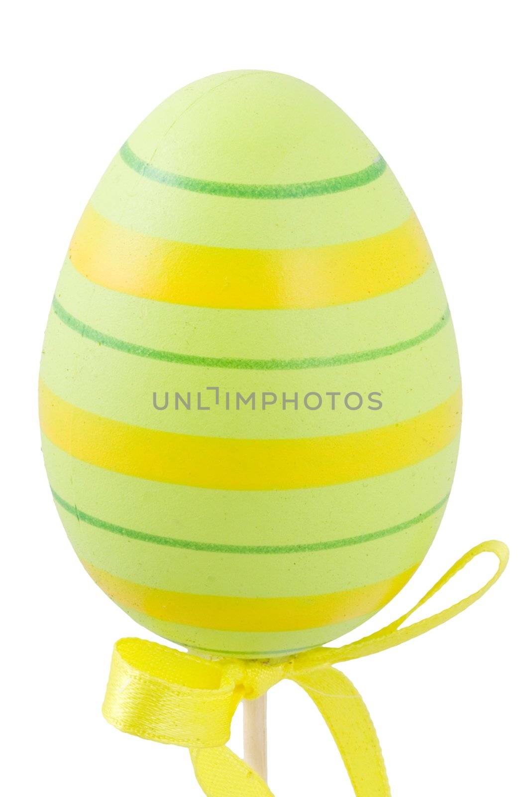 a green and yellow easter egg isolated on the white background