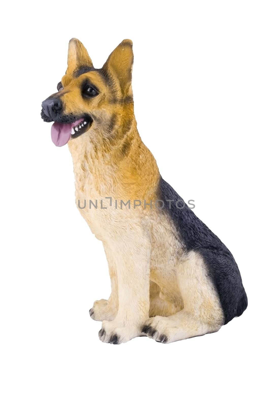 a small plastic toy doggie isolated on the white background