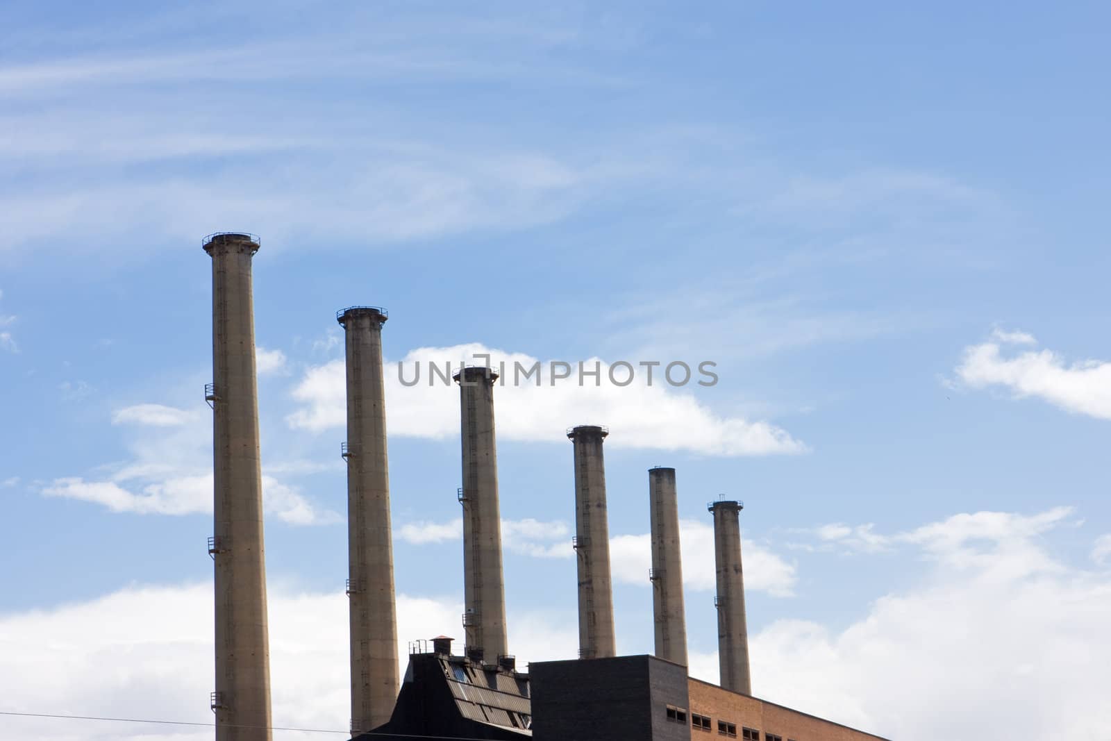 Row of smoke stacks from a coal power station
