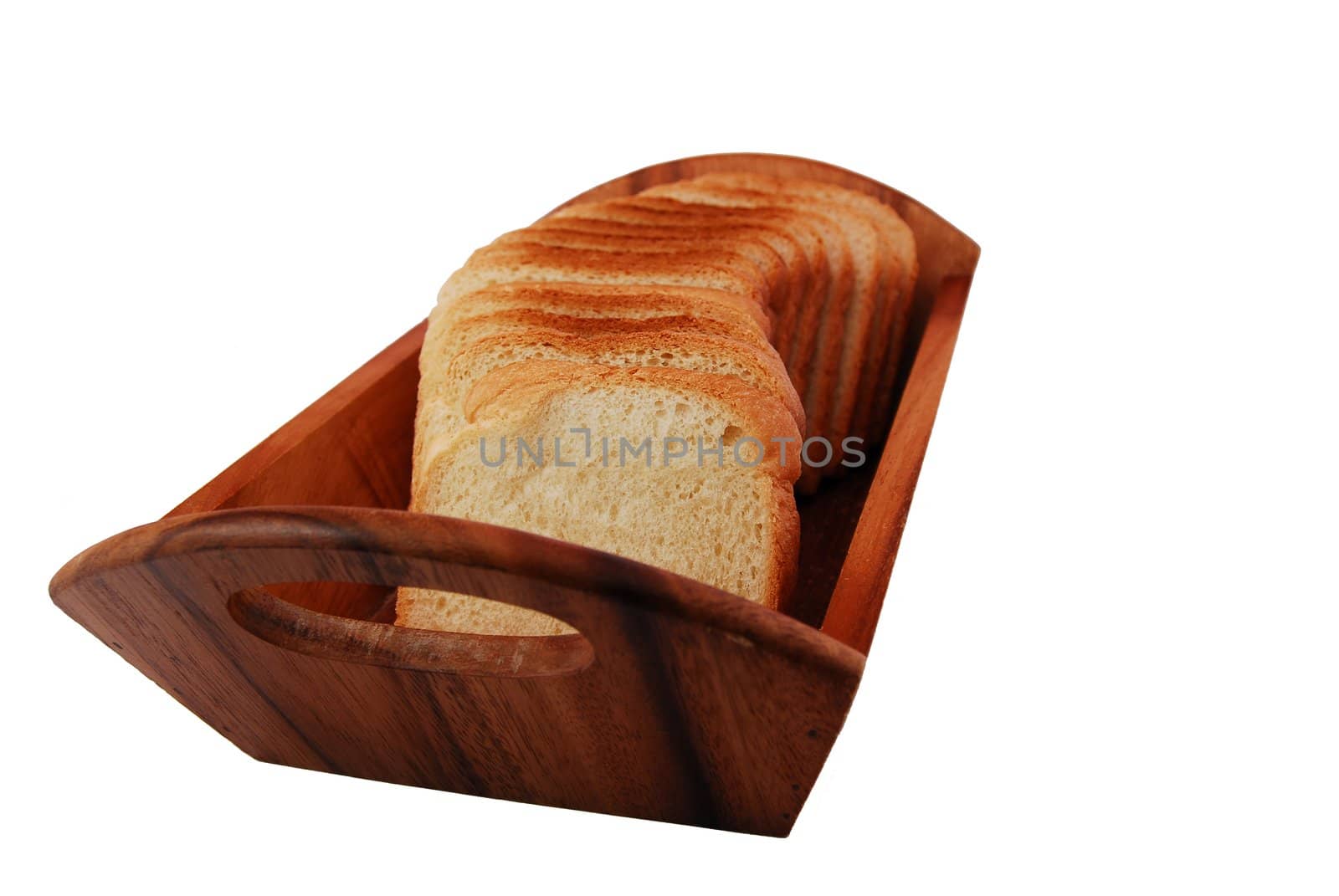 bread slices in wooden bowl