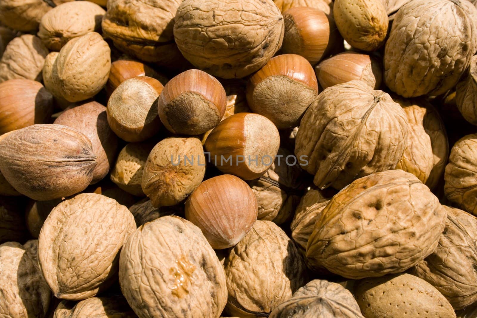 A close-up of a basket of various nuts.