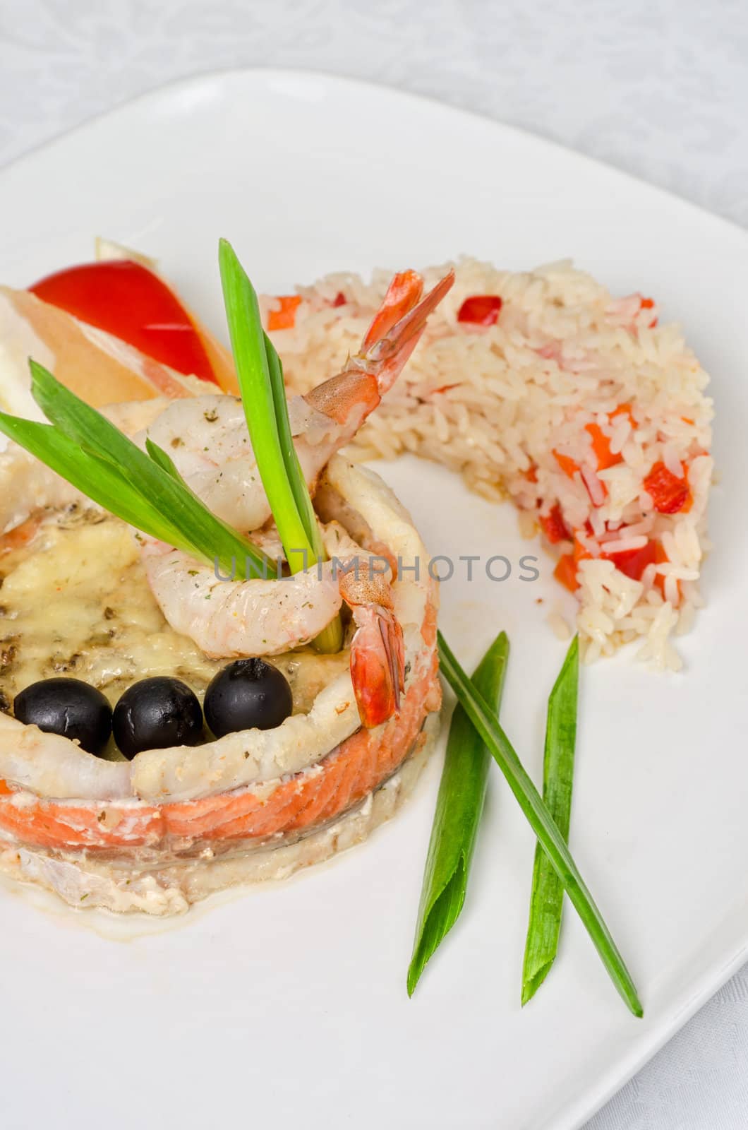 tasty prepared fish with rice and vegetables